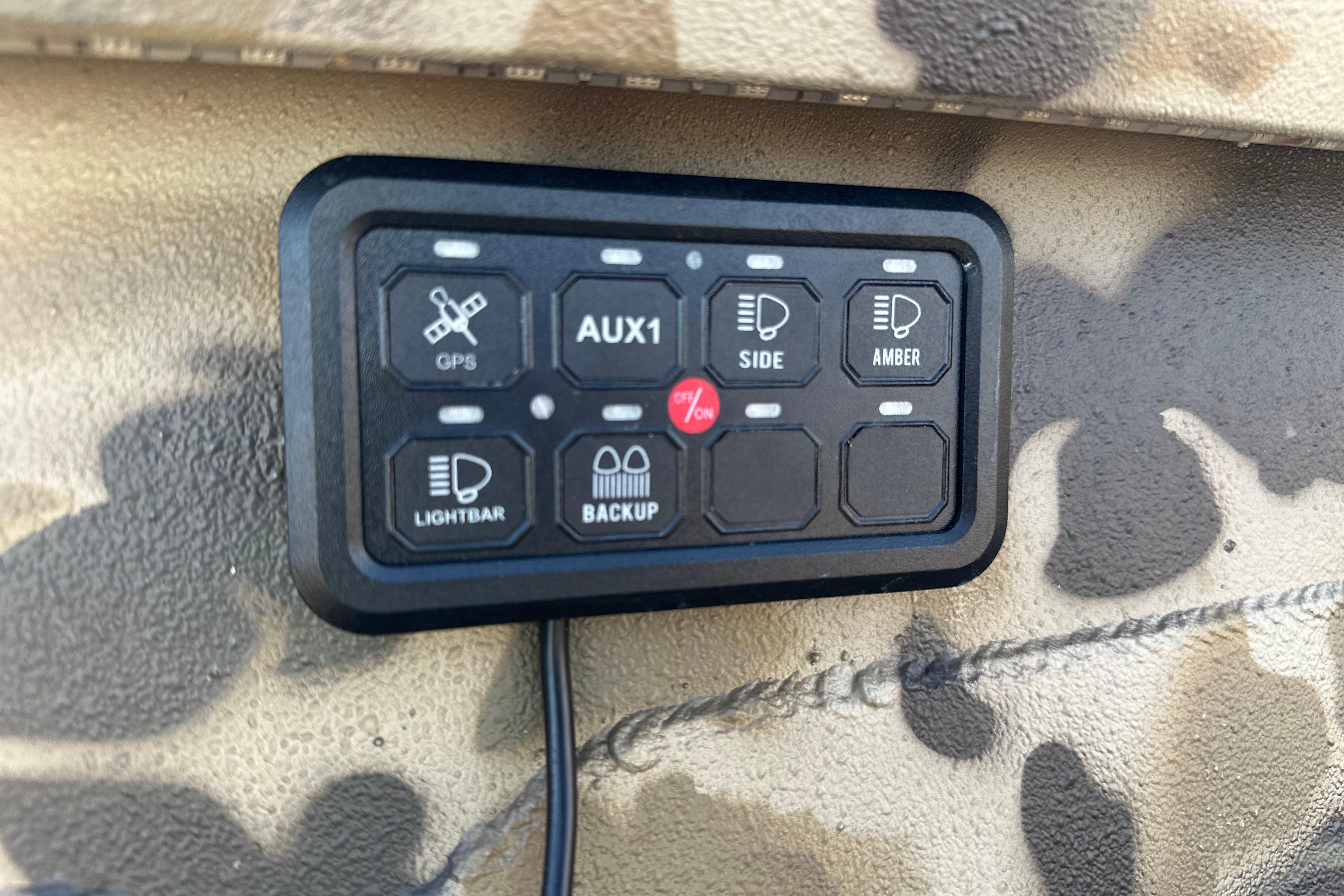 Control panel in Excel 1751 Viper F4, 2026 model, with camouflage background.