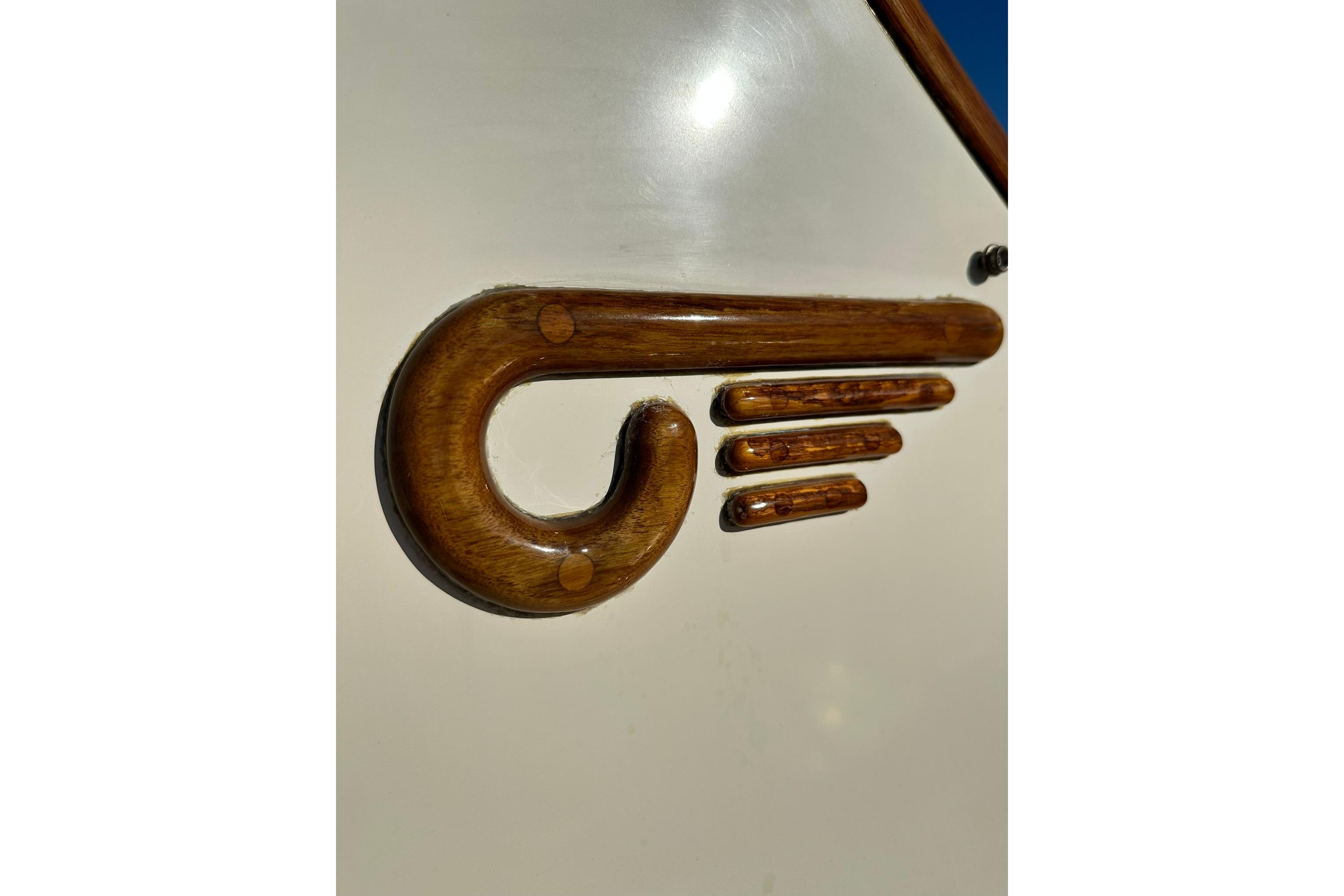 Wooden detail on 2000 Hinckley Picnic Boat 36, showcasing craftsmanship and design.