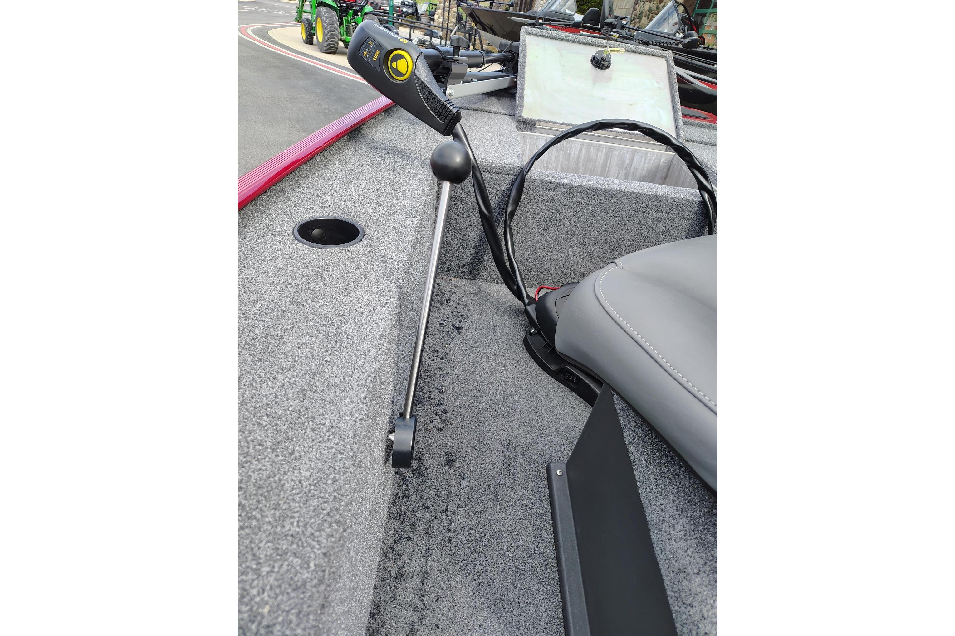 2025 Tracker Panfish 17 boat interior with steering mechanism and seating.