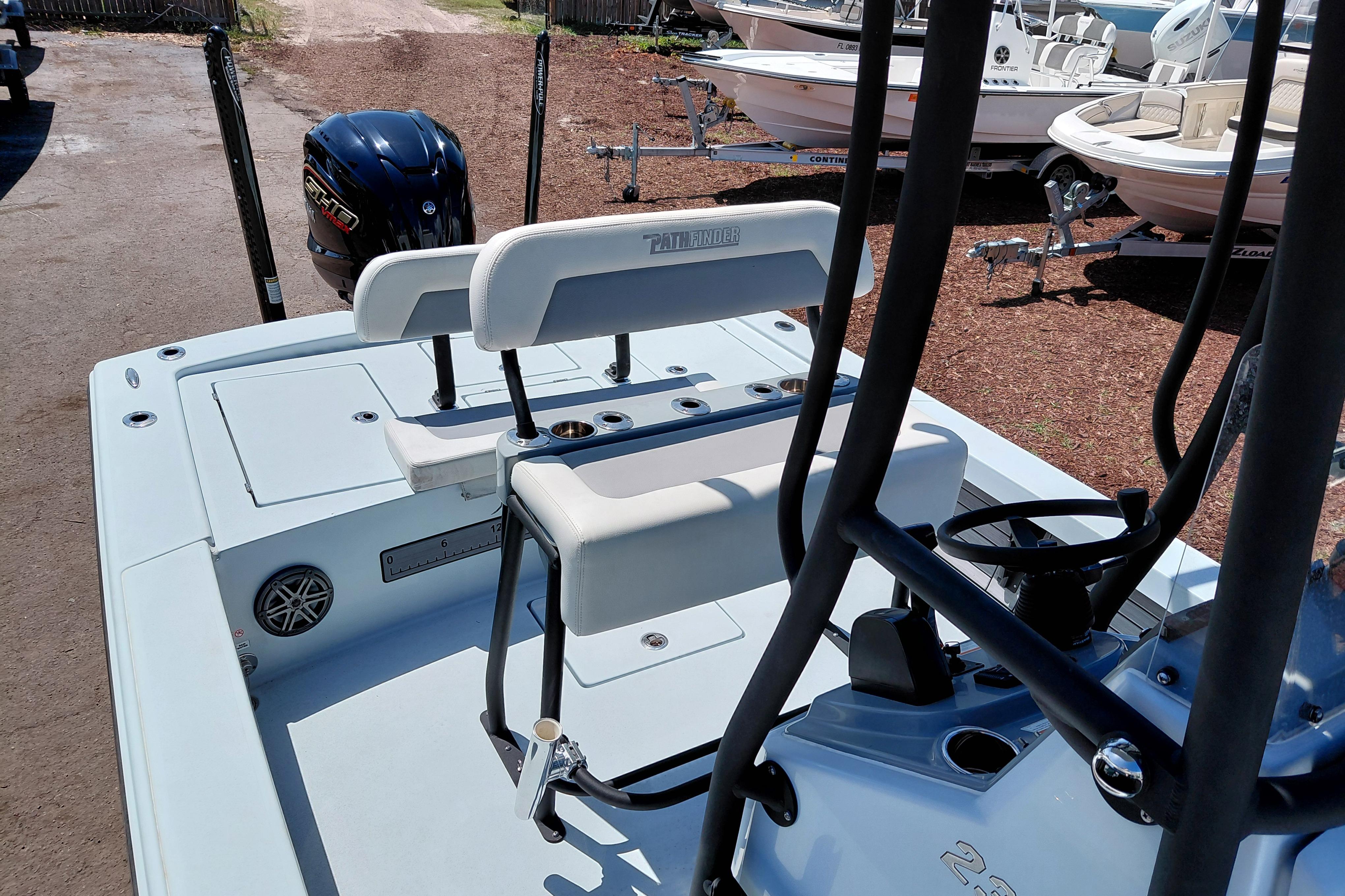 2022 Pathfinder 2300 HPS boat interior with seating and steering console.