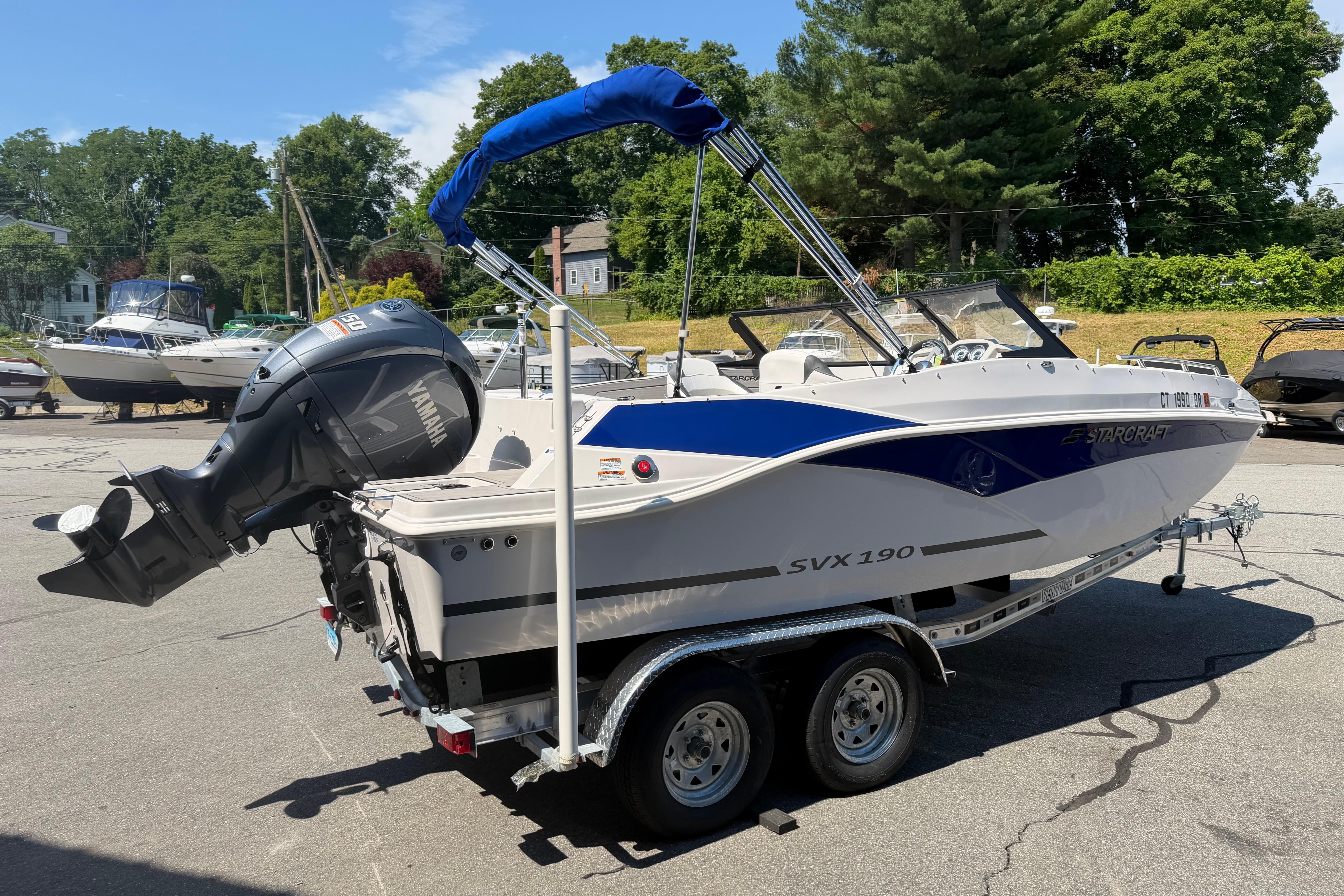 2025 Starcraft SVX 190 OB boat with Yamaha outboard motor on a trailer.