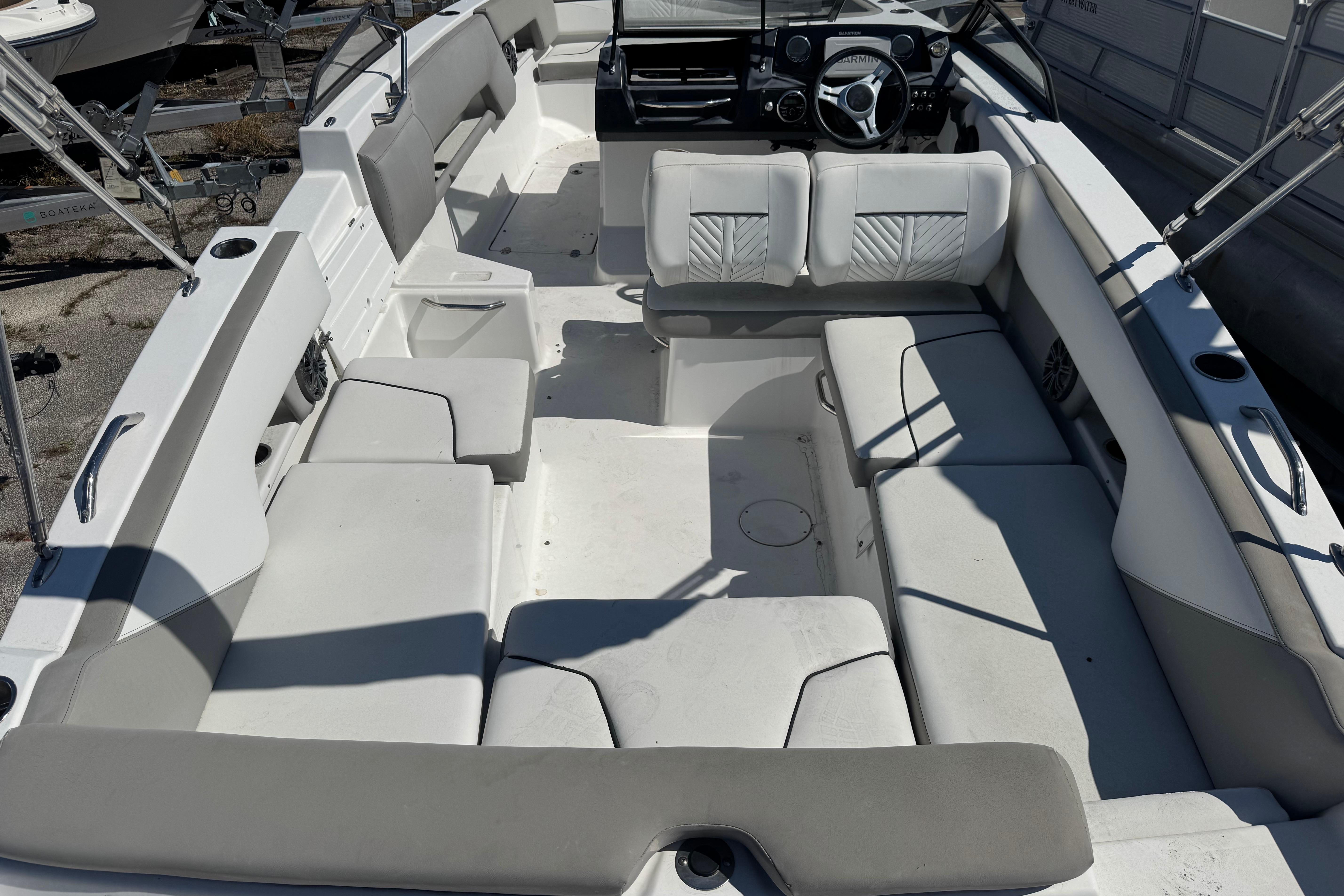 2020 Glastron GTD 240 boat interior with spacious seating and modern dashboard.