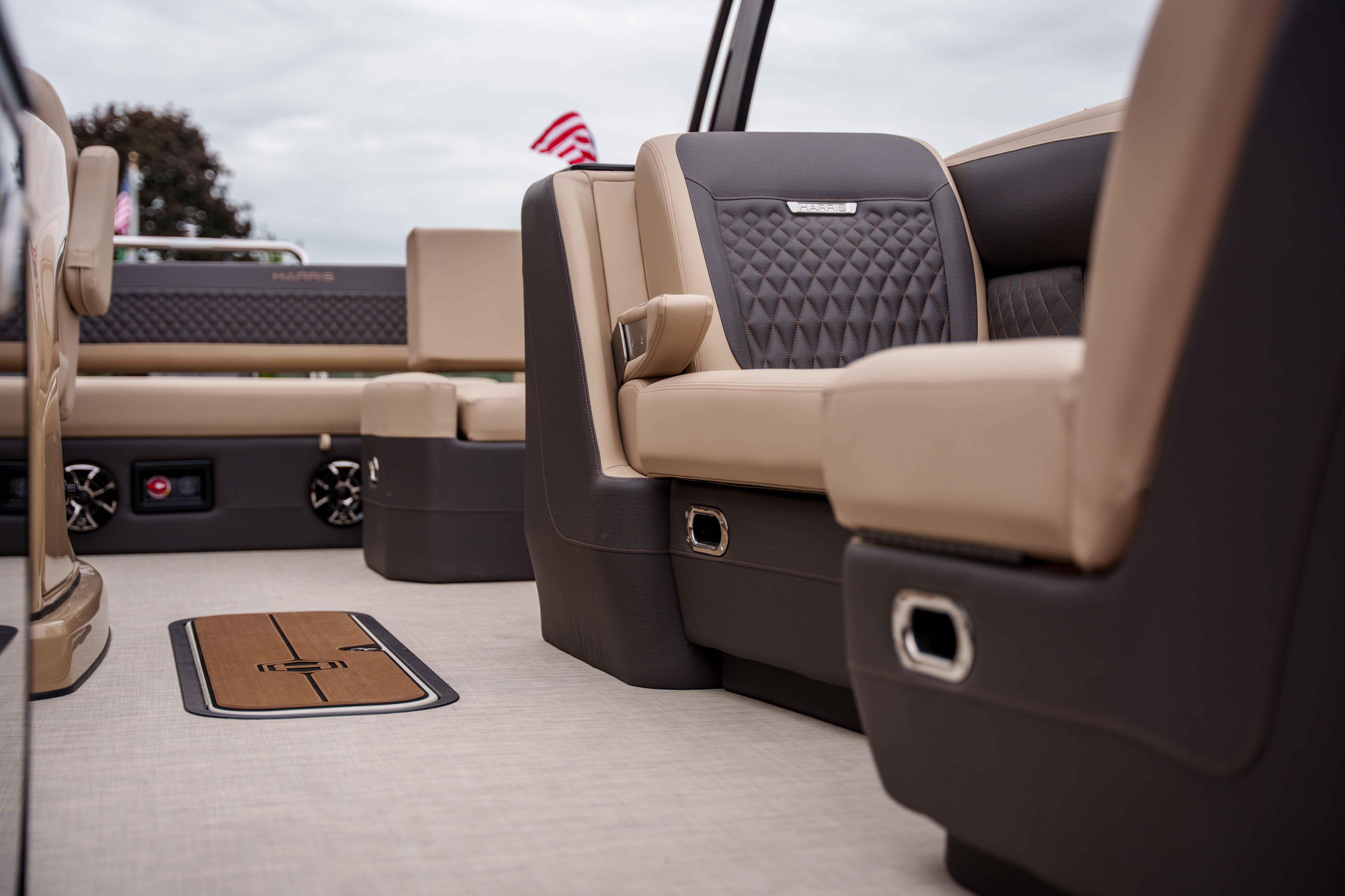 Luxurious interior of 2026 Harris Sunliner 230 pontoon boat with plush seating and elegant design.