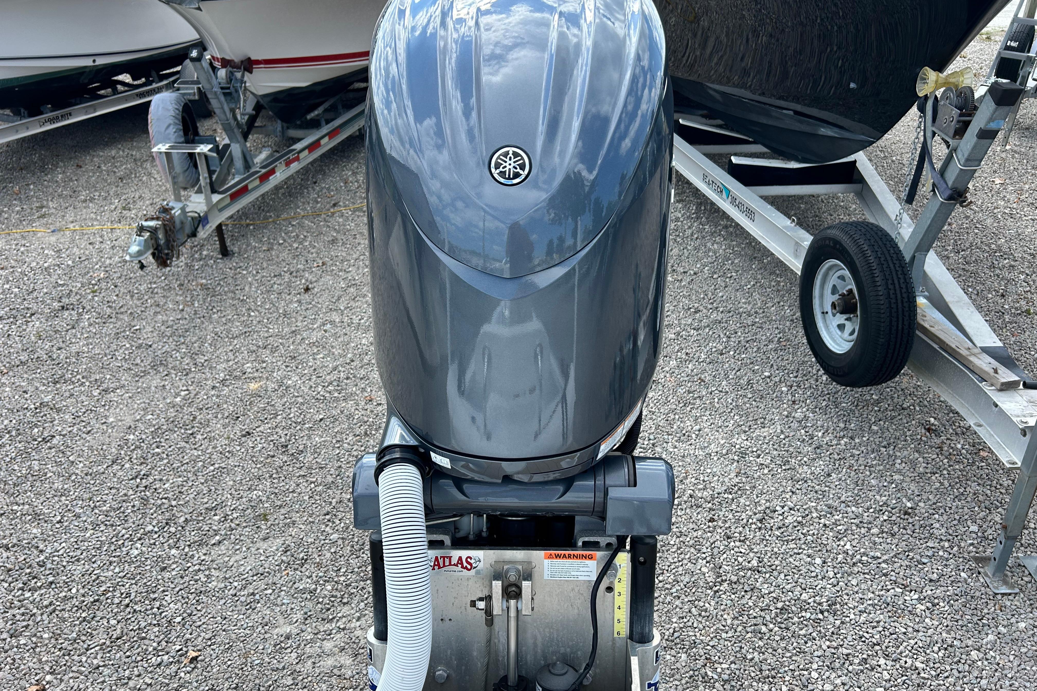 2025 Dragonfly Boatworks Spanish Wells 21 with Yamaha outboard motor on trailer.