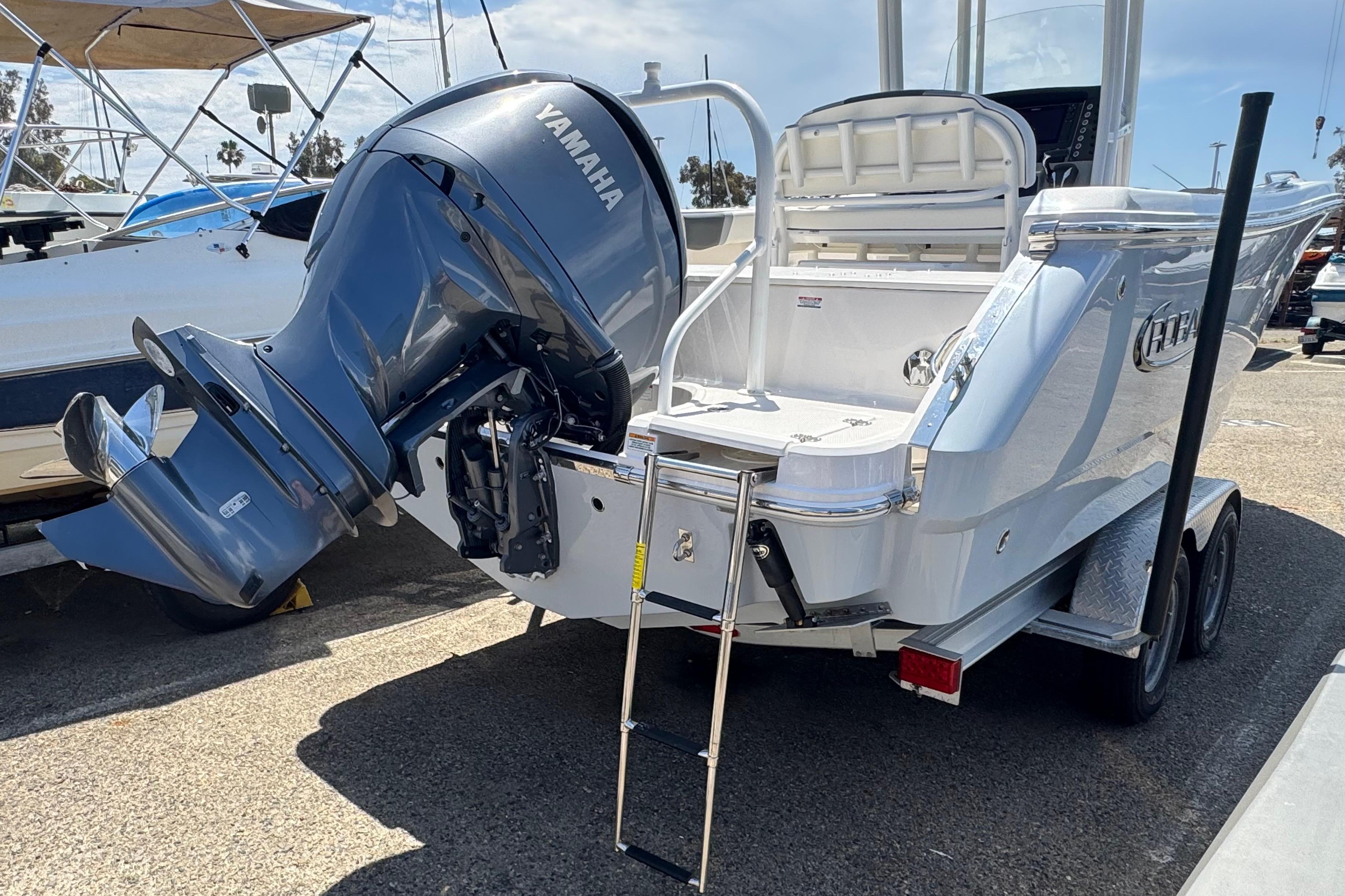2022 Robalo R230 Center Console boat with Yamaha outboard motor on trailer.