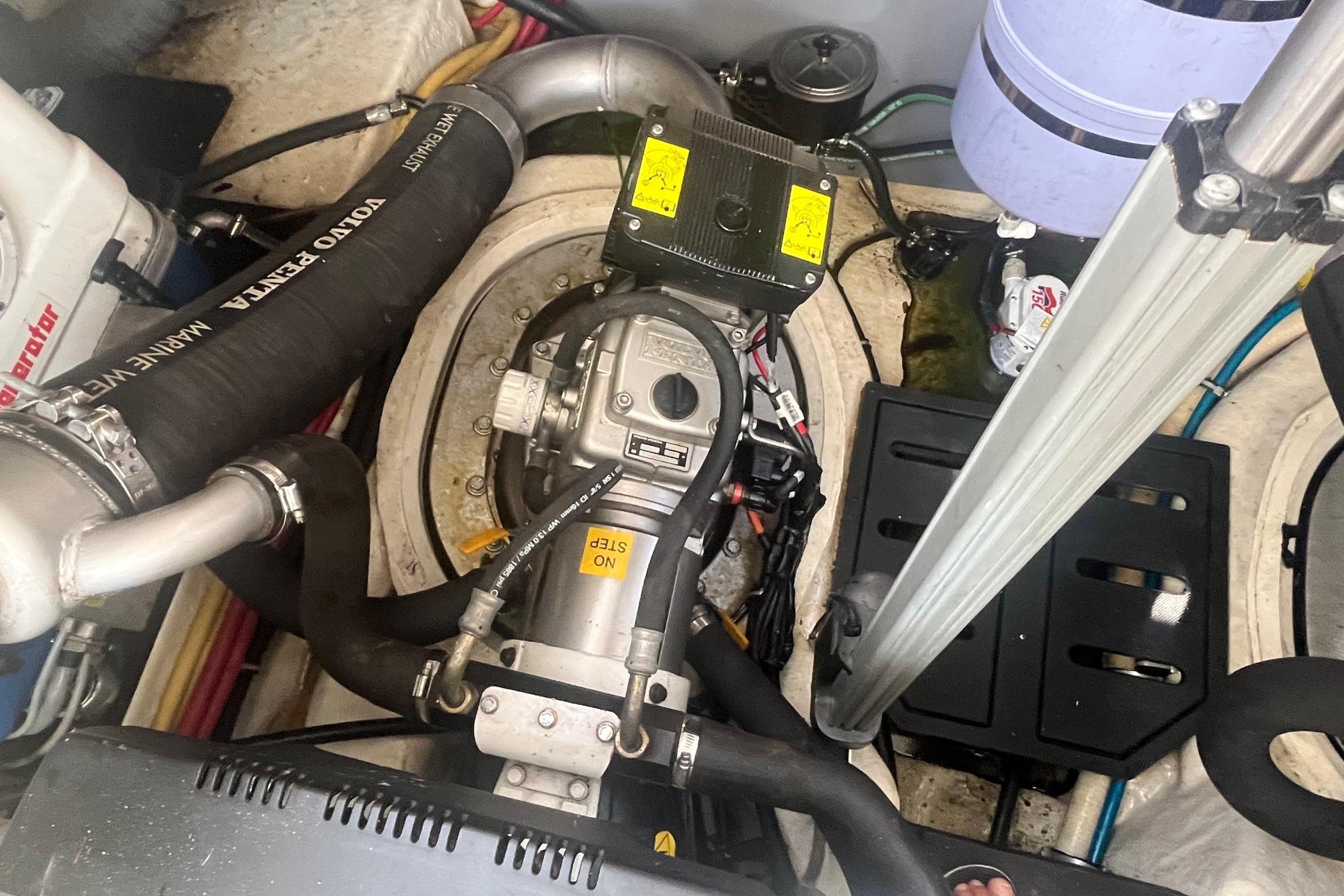 Engine compartment of a 2010 Monterey 400 Sport Yacht, featuring Volvo Penta components.