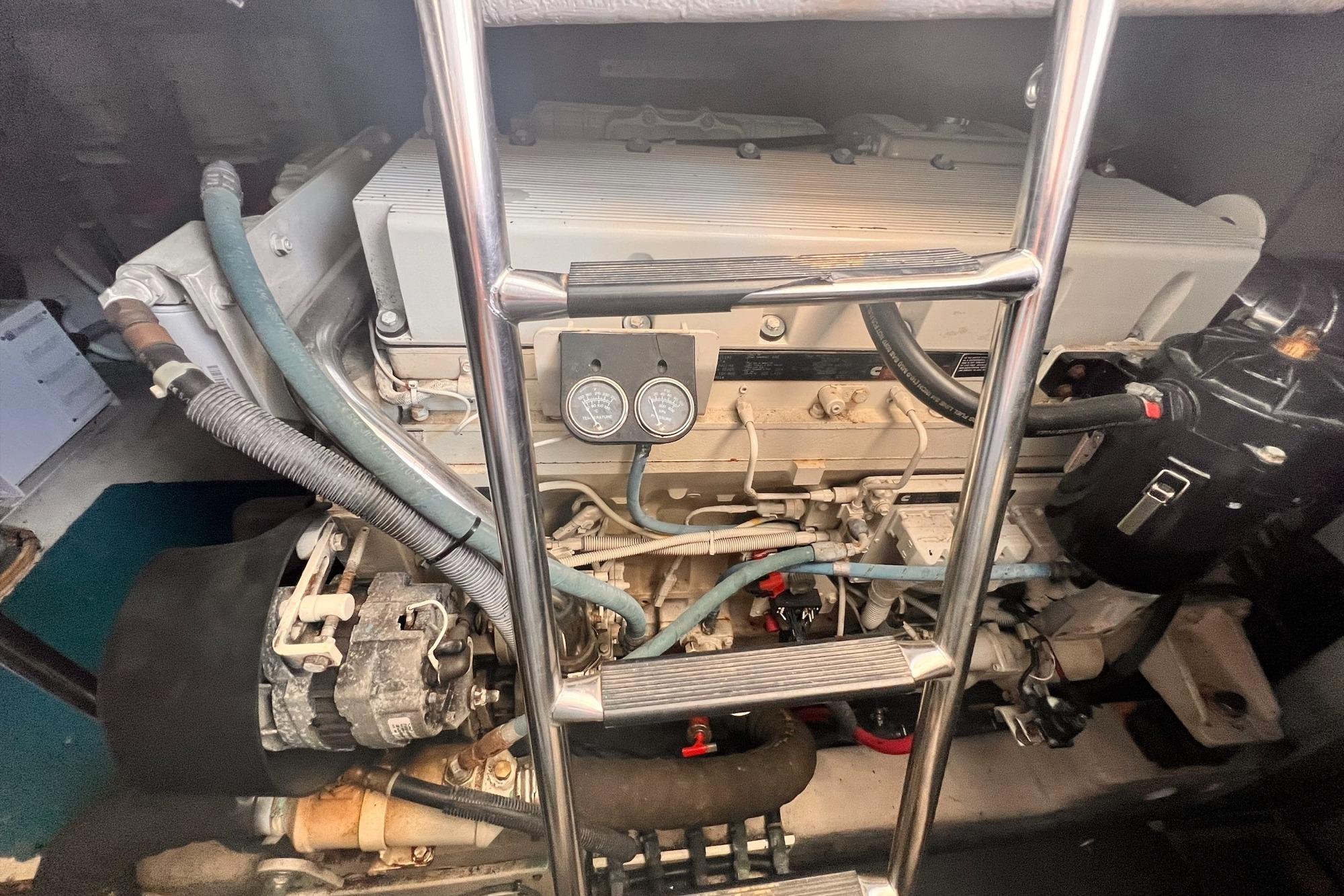 Engine compartment of a 2005 Sea Ray 500 Sundancer yacht, showcasing mechanical components.