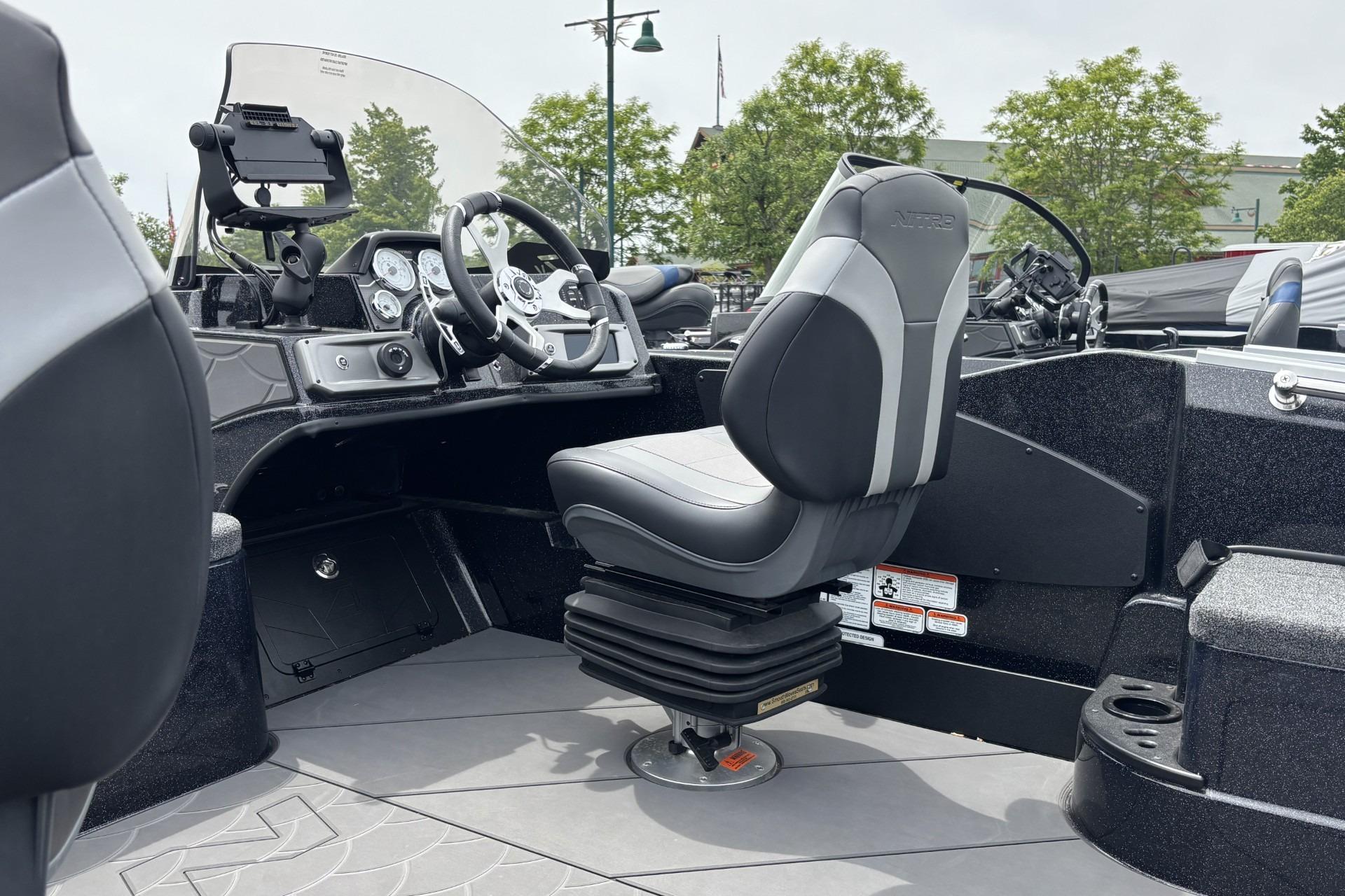 Interior of 2026 Nitro ZV21 boat featuring modern steering and seating.