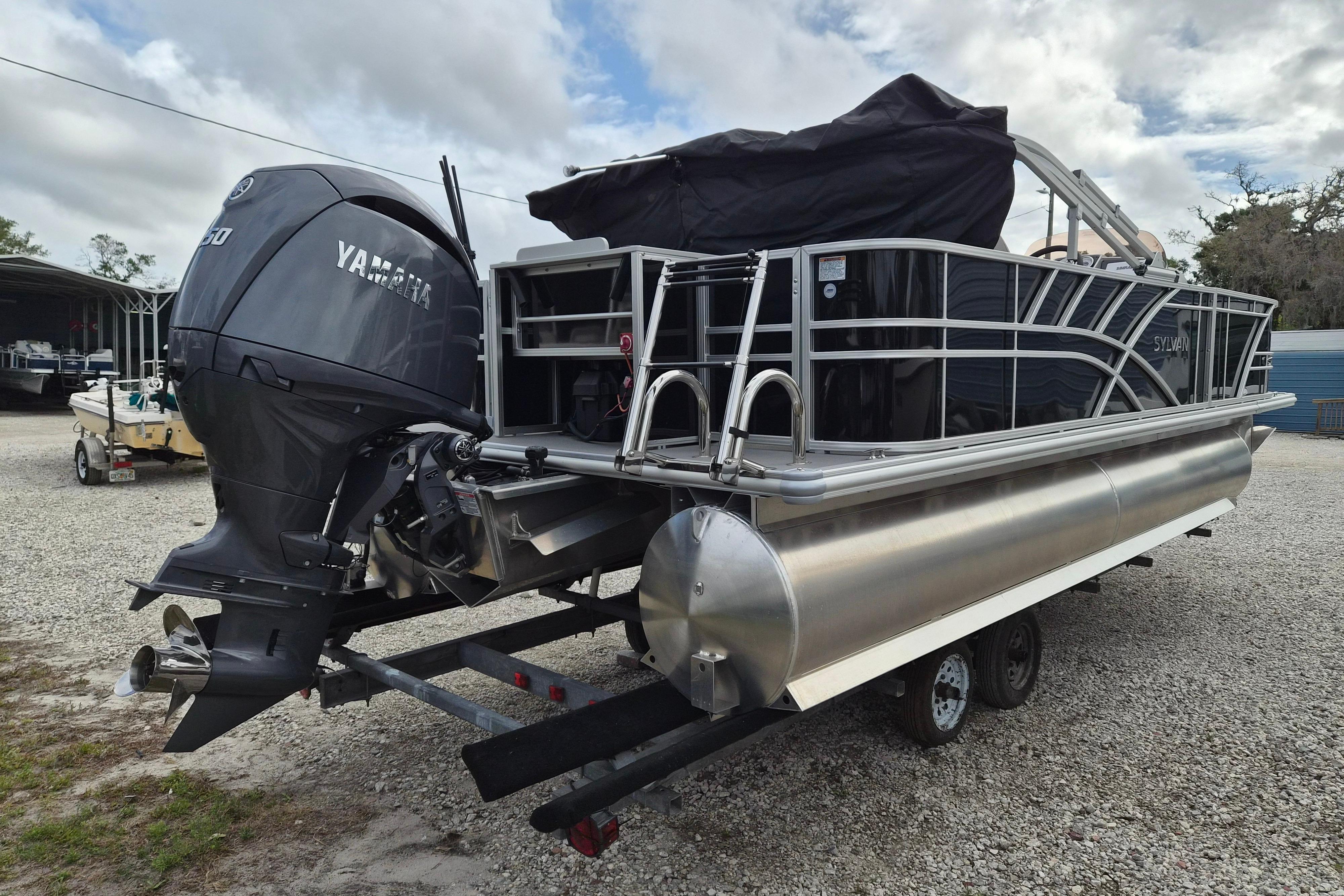 2025 Sylvan Mirage Fish 8522 Party Fish 4.0 pontoon boat with Yamaha outboard motor.