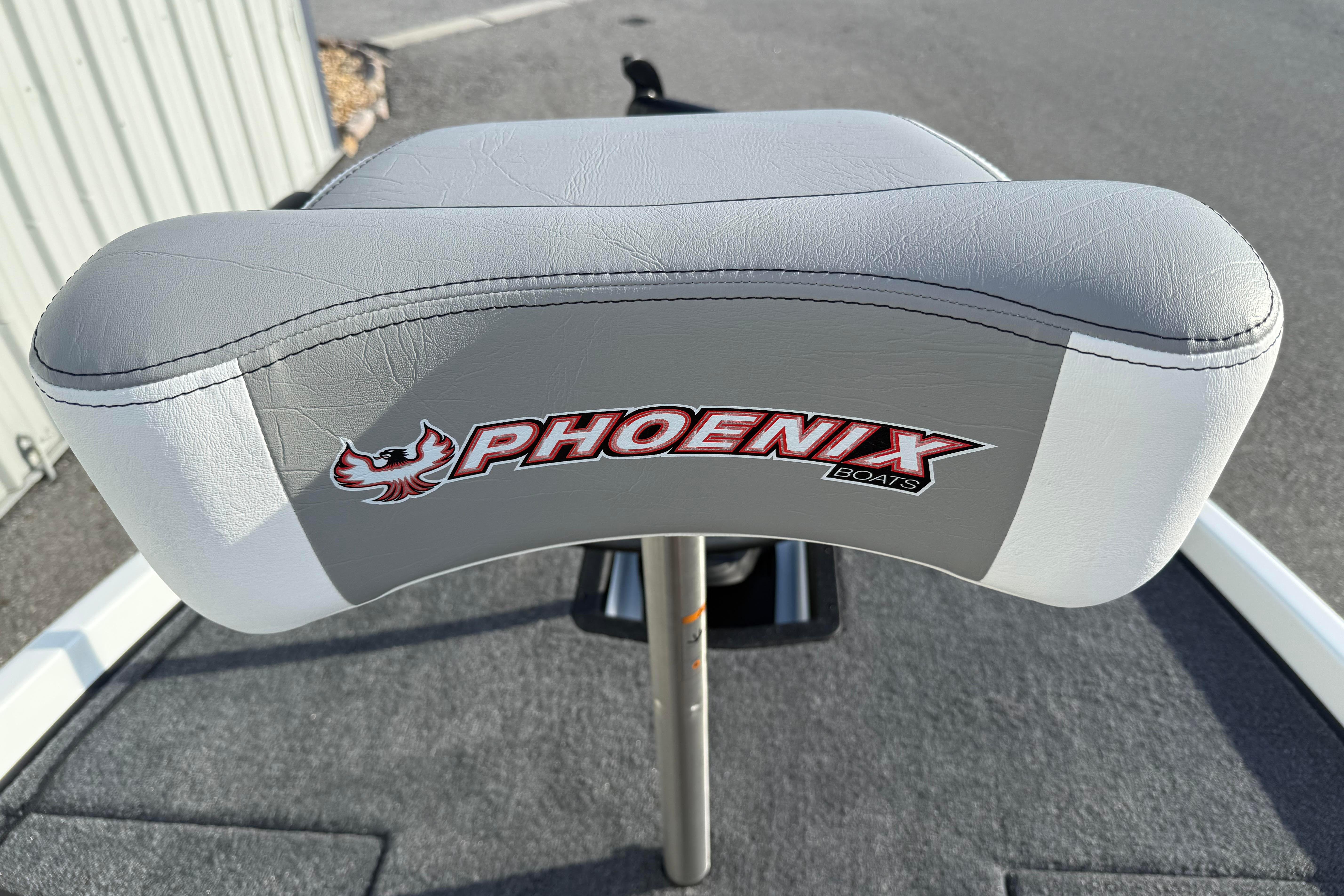 2027 Phoenix 721 ZXL boat seat with logo, featuring gray and white upholstery.