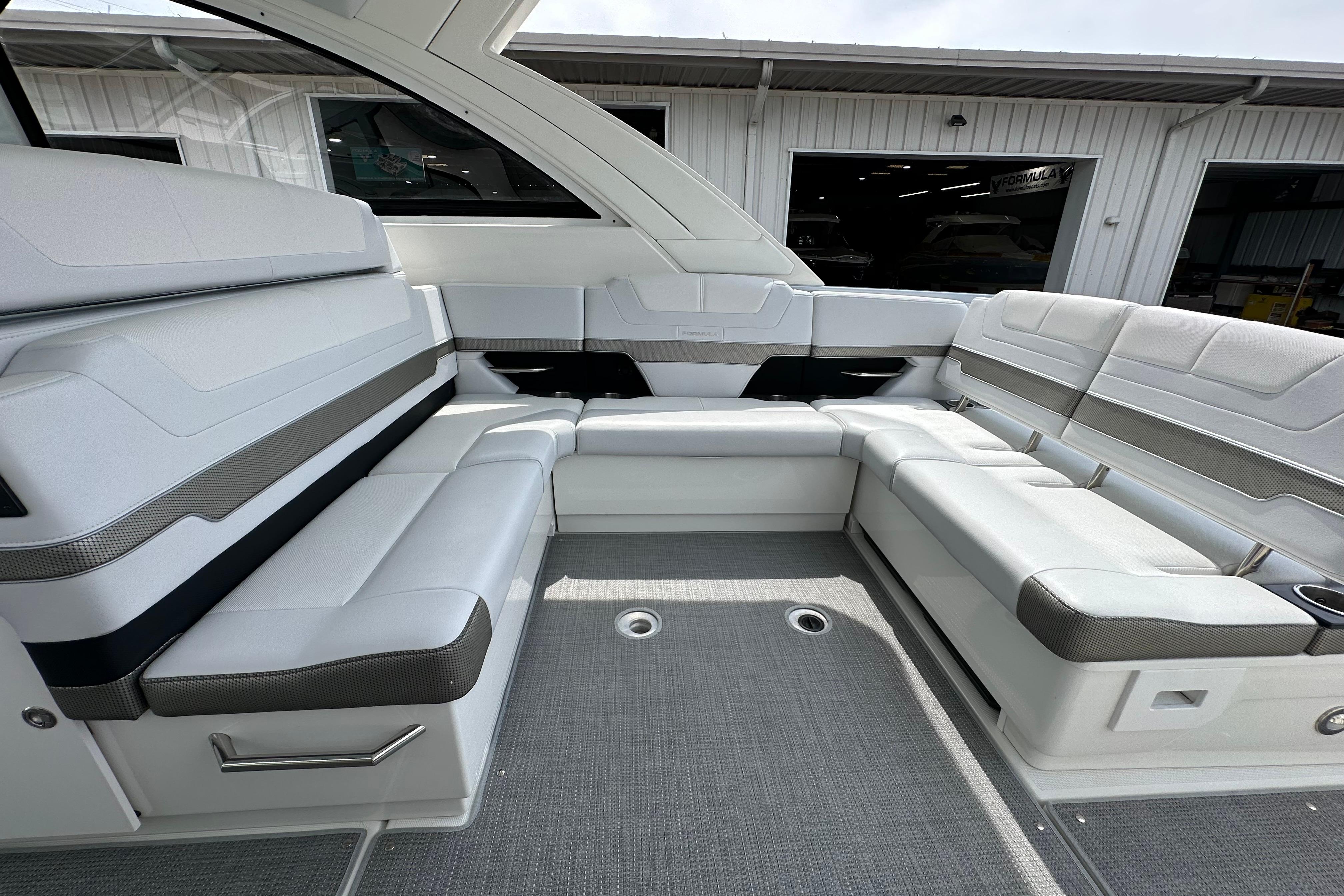 Luxurious seating area on a 2021 Formula 380 Super Sport Crossover OB boat.