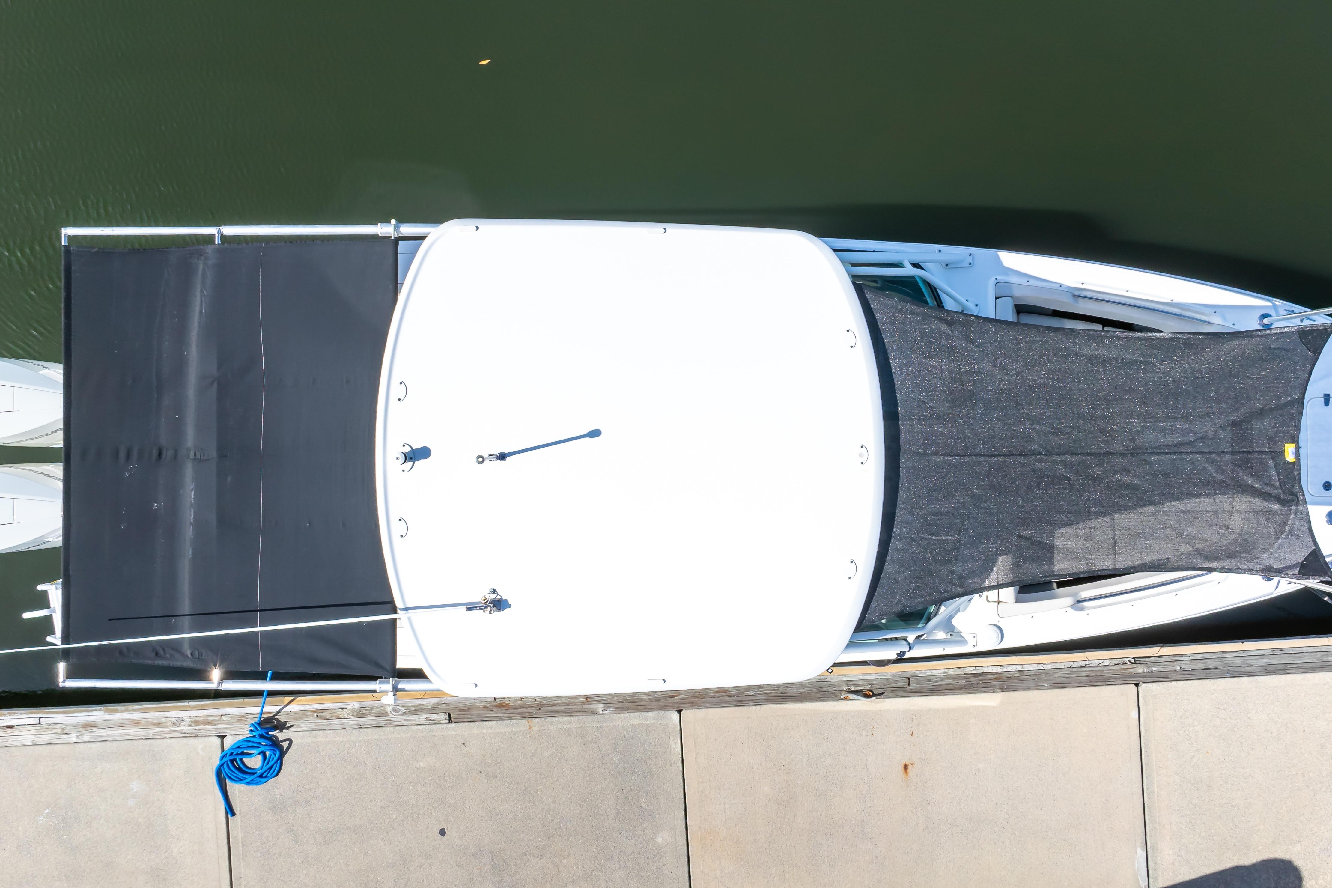 Overhead view of a 2019 Boston Whaler 270 Vantage docked by the water.