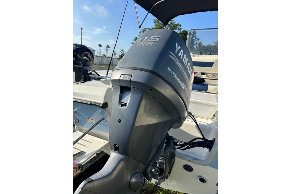 2005 Hydra-Sports Lightning 180 CC with Yamaha 115 outboard motor, docked outdoors.