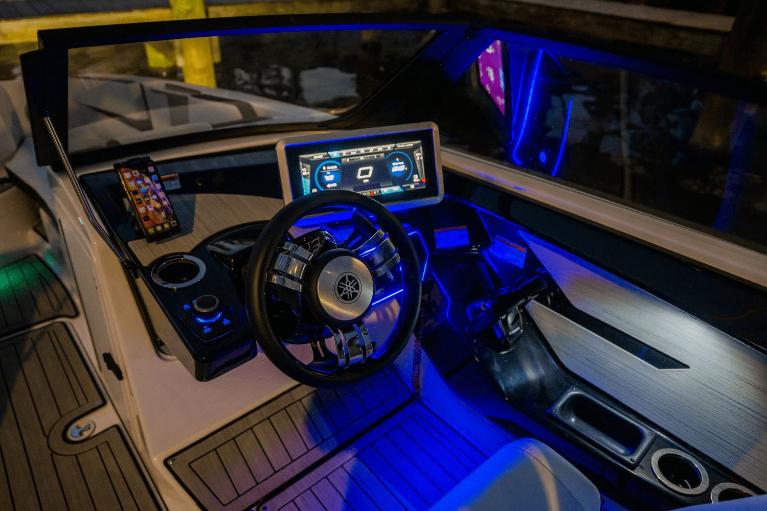 The Yamaha 222SD cockpit features a modern steering wheel and digital dashboard.