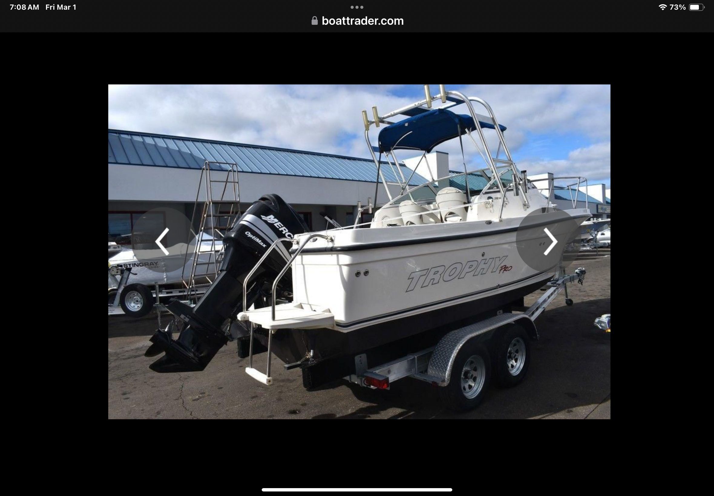 2008 Trophy 22 WA boat on trailer with outboard motor.