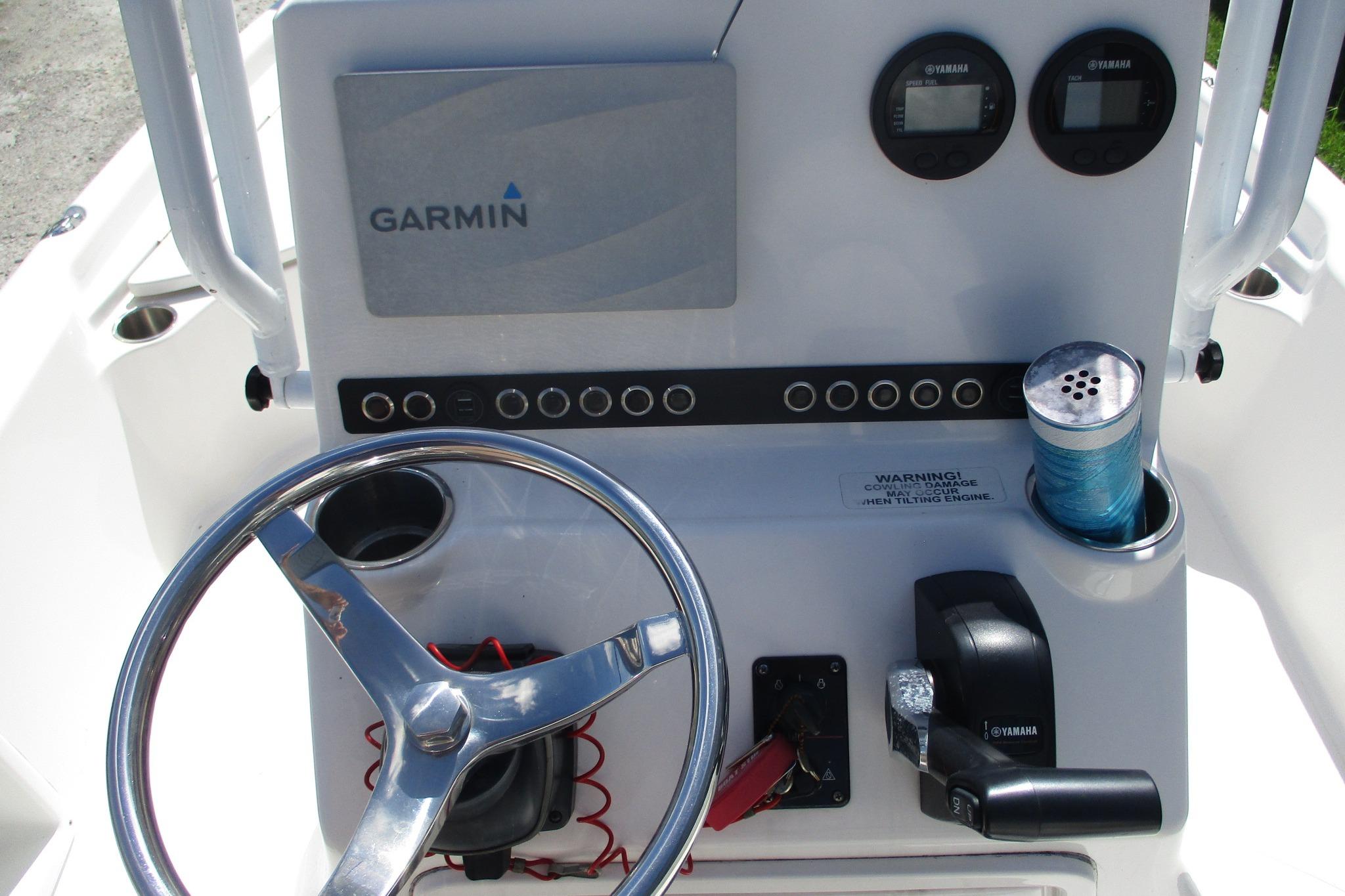 Center console of 2021 Blue Wave 2000 PureBay boat with Garmin navigation system.