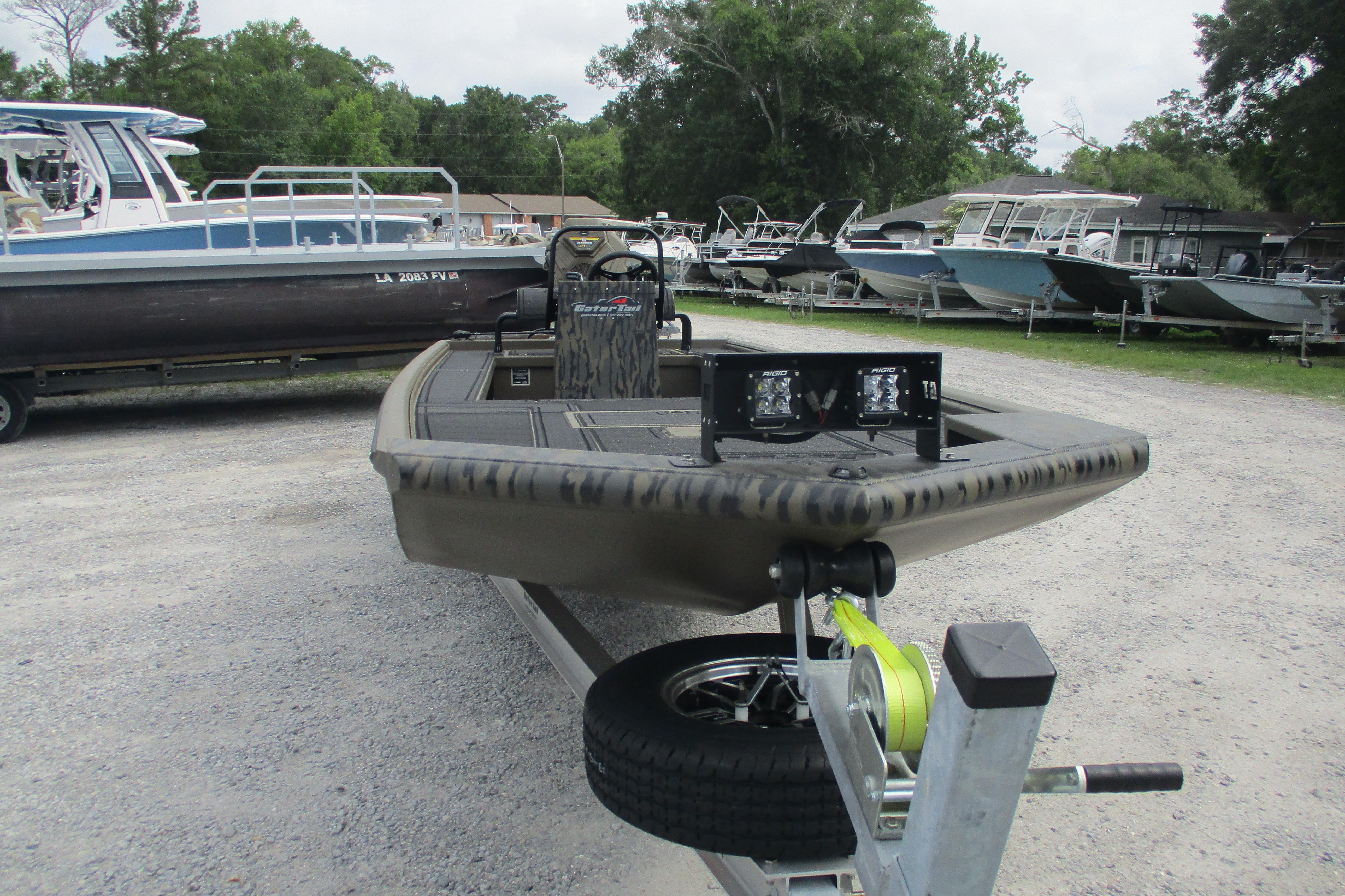 2026 Gator Tail 2060 Extreme CC boat on trailer in outdoor lot.