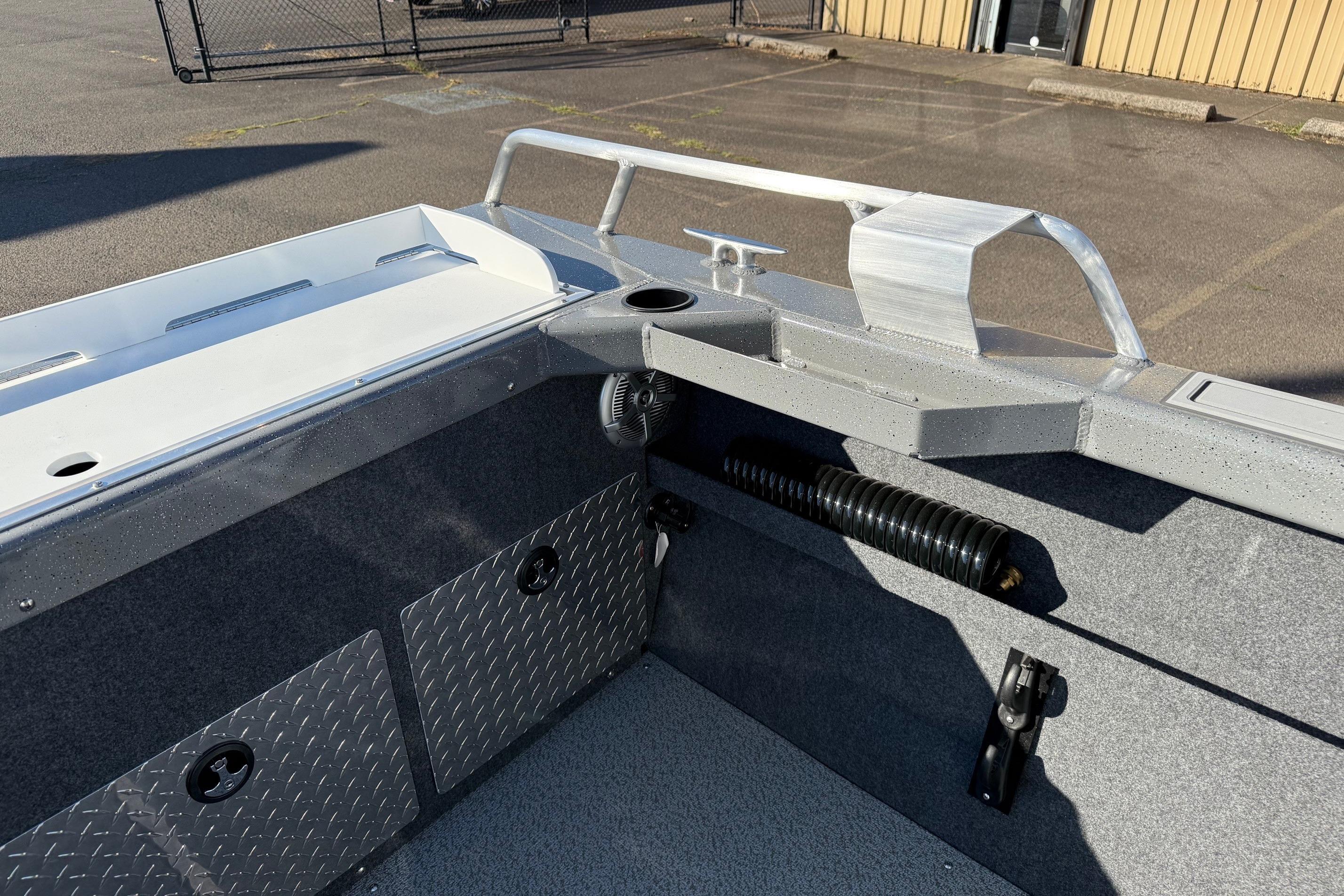 Interior view of 2026 Thunder Jet 185 Luxor boat, featuring storage compartments and sleek design.