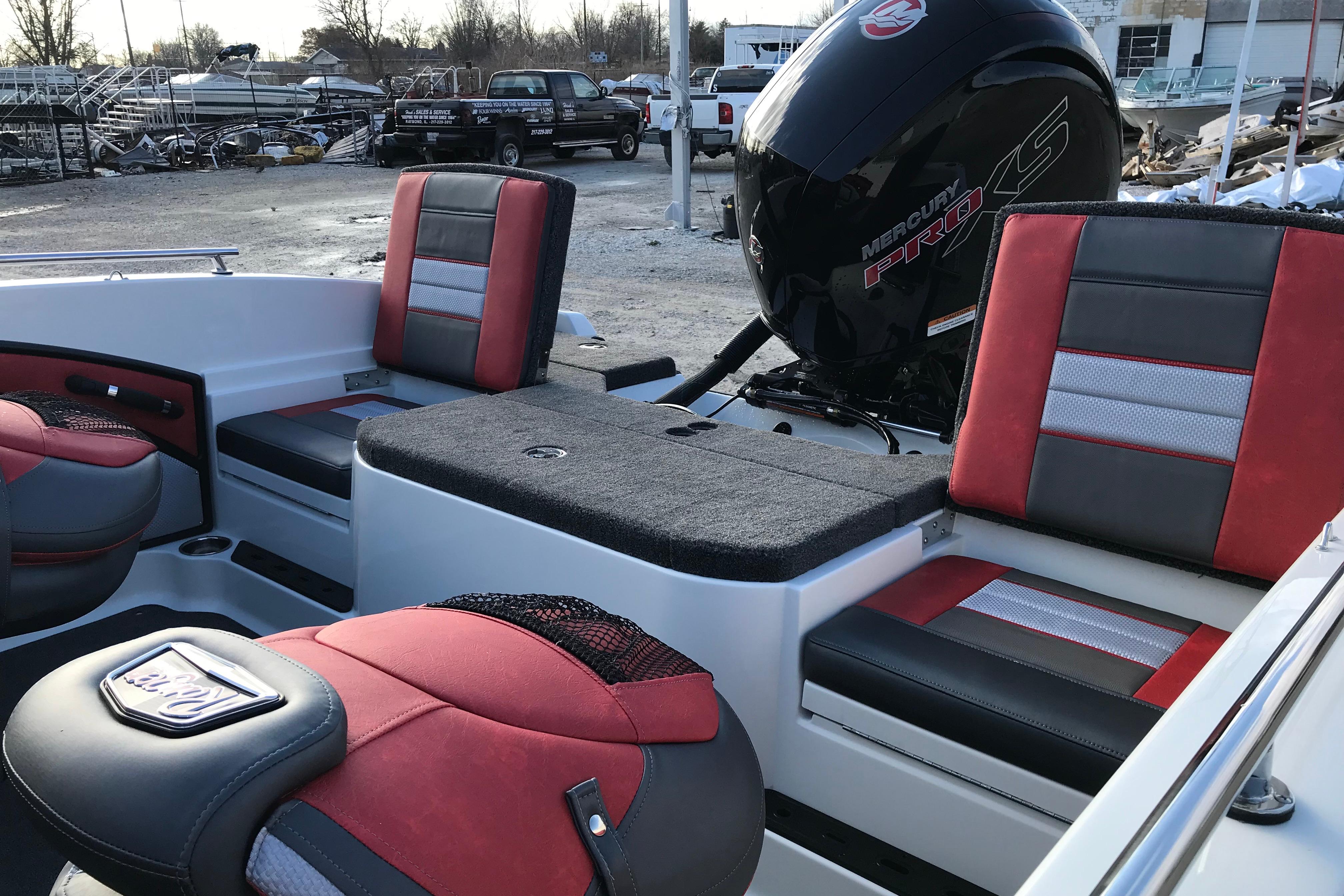 2026 Ranger 1850MS boat interior with red and black seating, Mercury Pro XS engine.