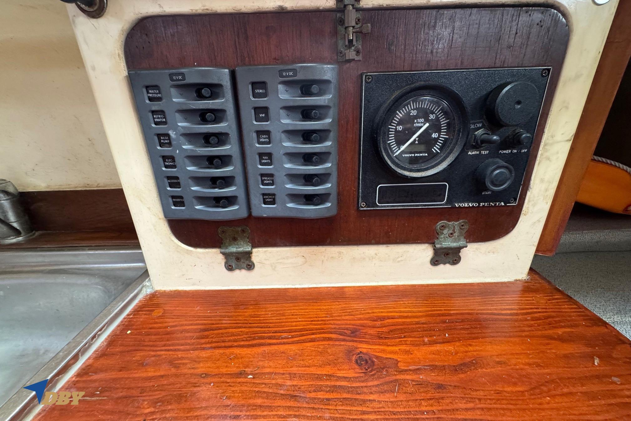 Control panel of a 1988 Phantom 33 boat with Volvo Penta gauge.