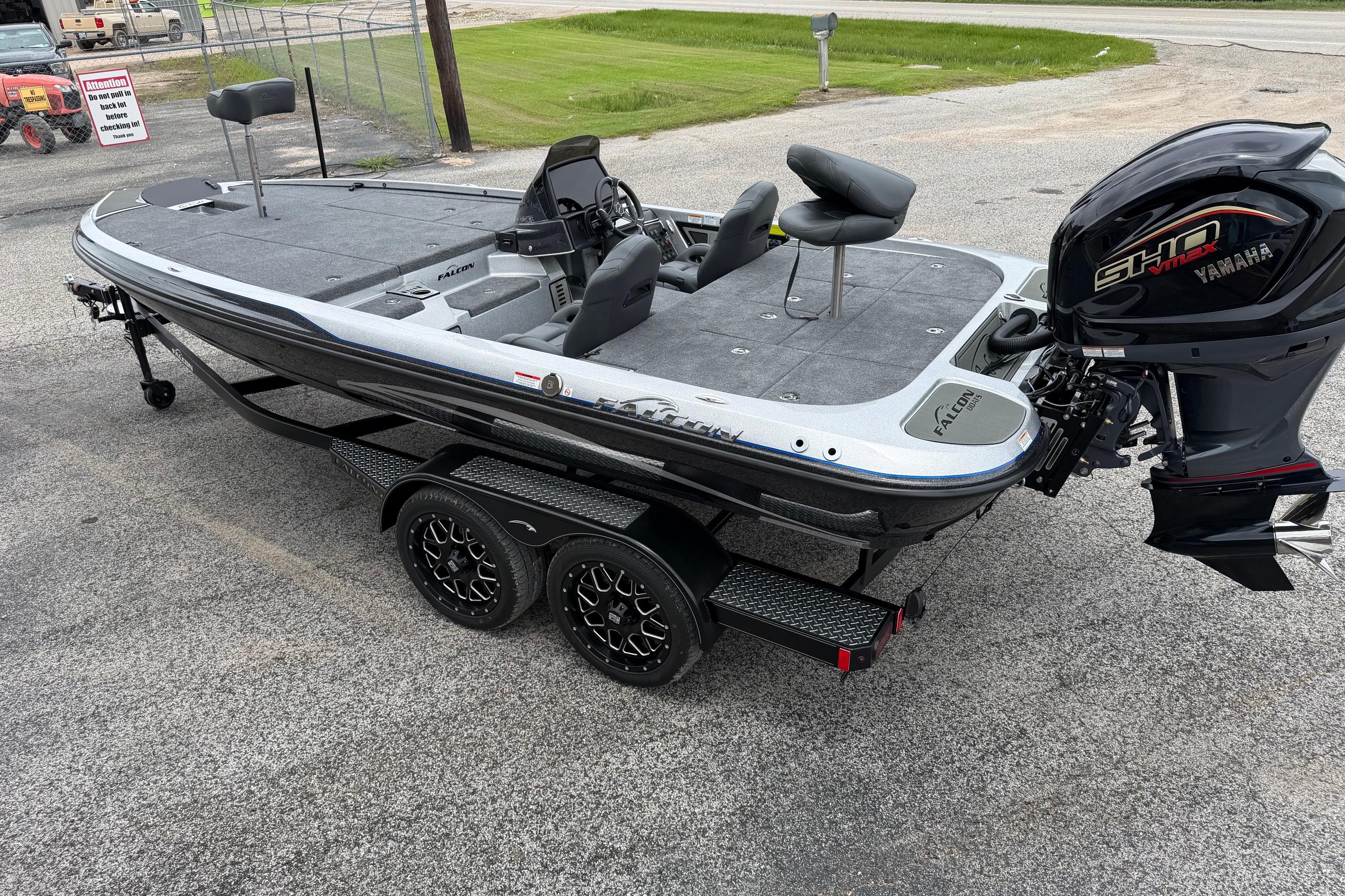 2027 Falcon F20 PREDATOR fishing boat with Yamaha engine on a trailer.