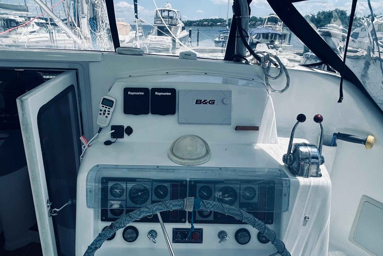 Cockpit of a 2001 Robertson & Caine Leopard yacht with navigation equipment.