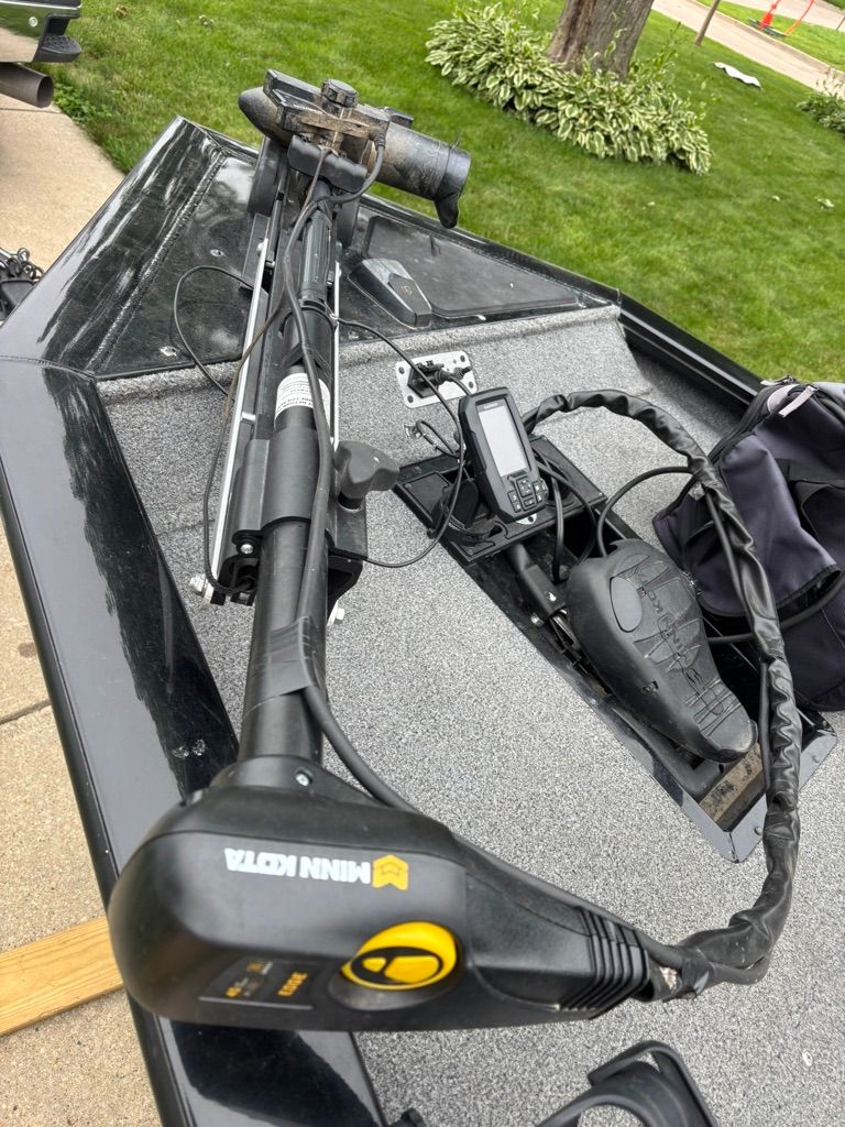 A 2020 Bass Tracker Pro 175TXW with a Minn Kota trolling motor and a fish finder.