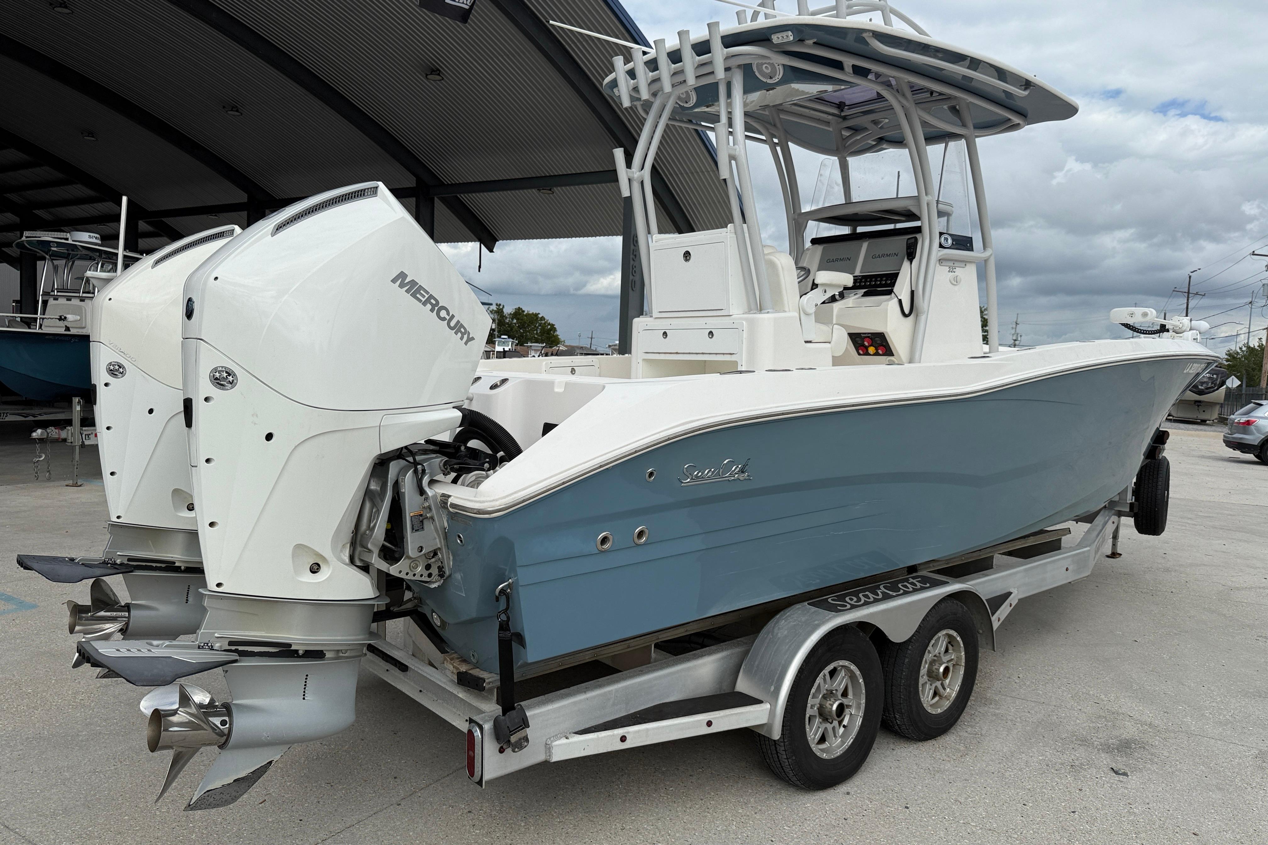 2021 Sea Cat 260 boat with dual Mercury engines on a trailer.