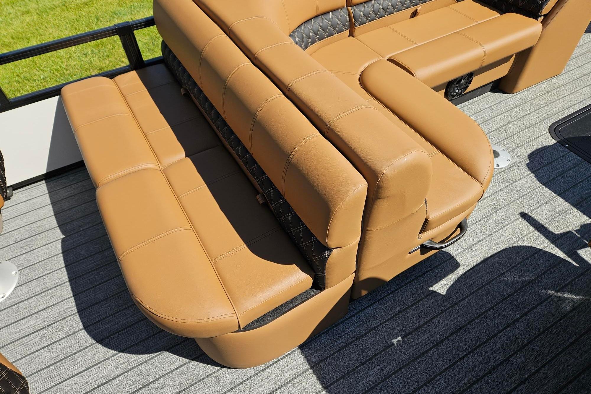Luxurious tan seating on 2026 Ranger 223F boat, featuring sleek design and comfortable upholstery.