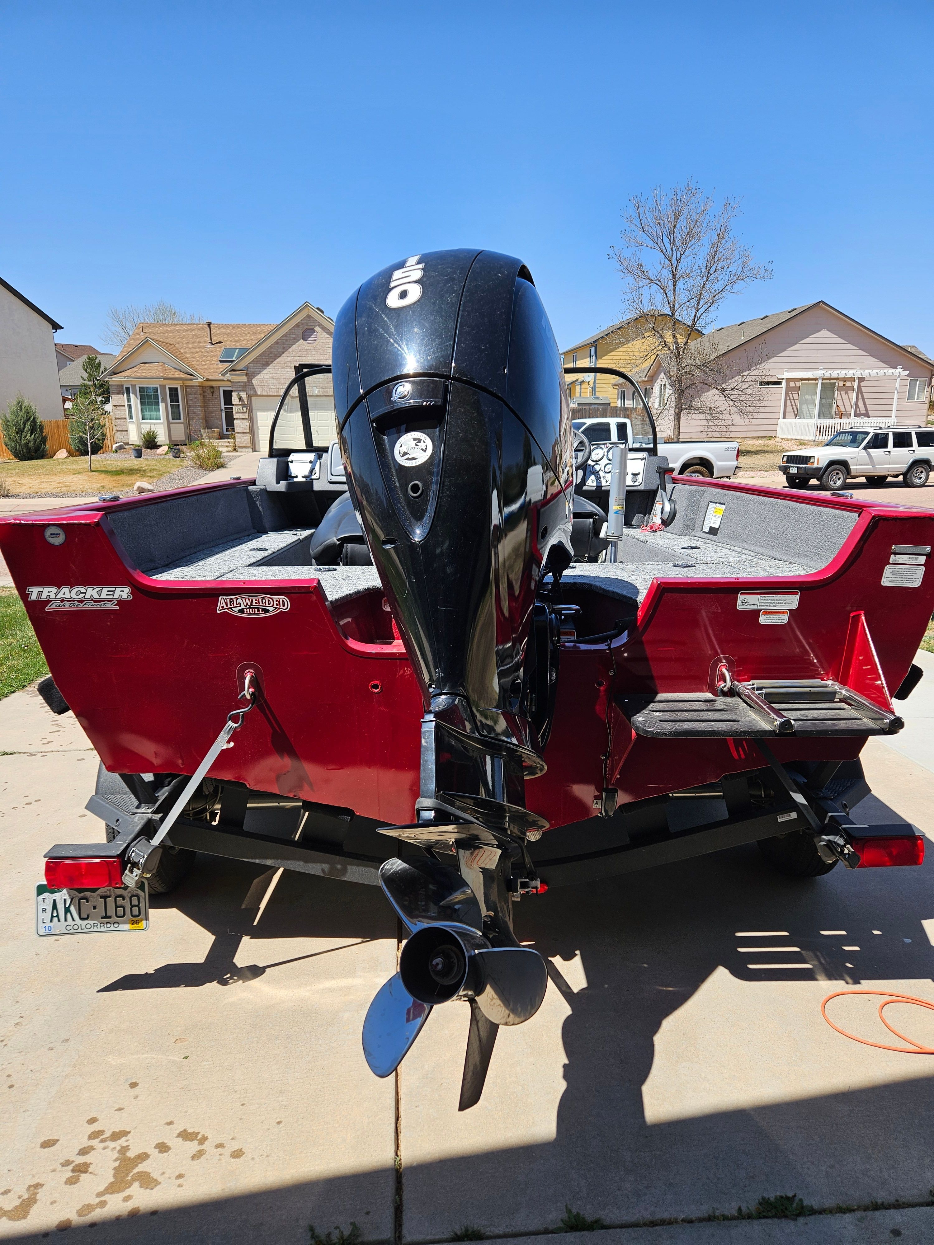 Red Tracker Pro Guide V-175 WT boat, 2021 model, on a trailer.
