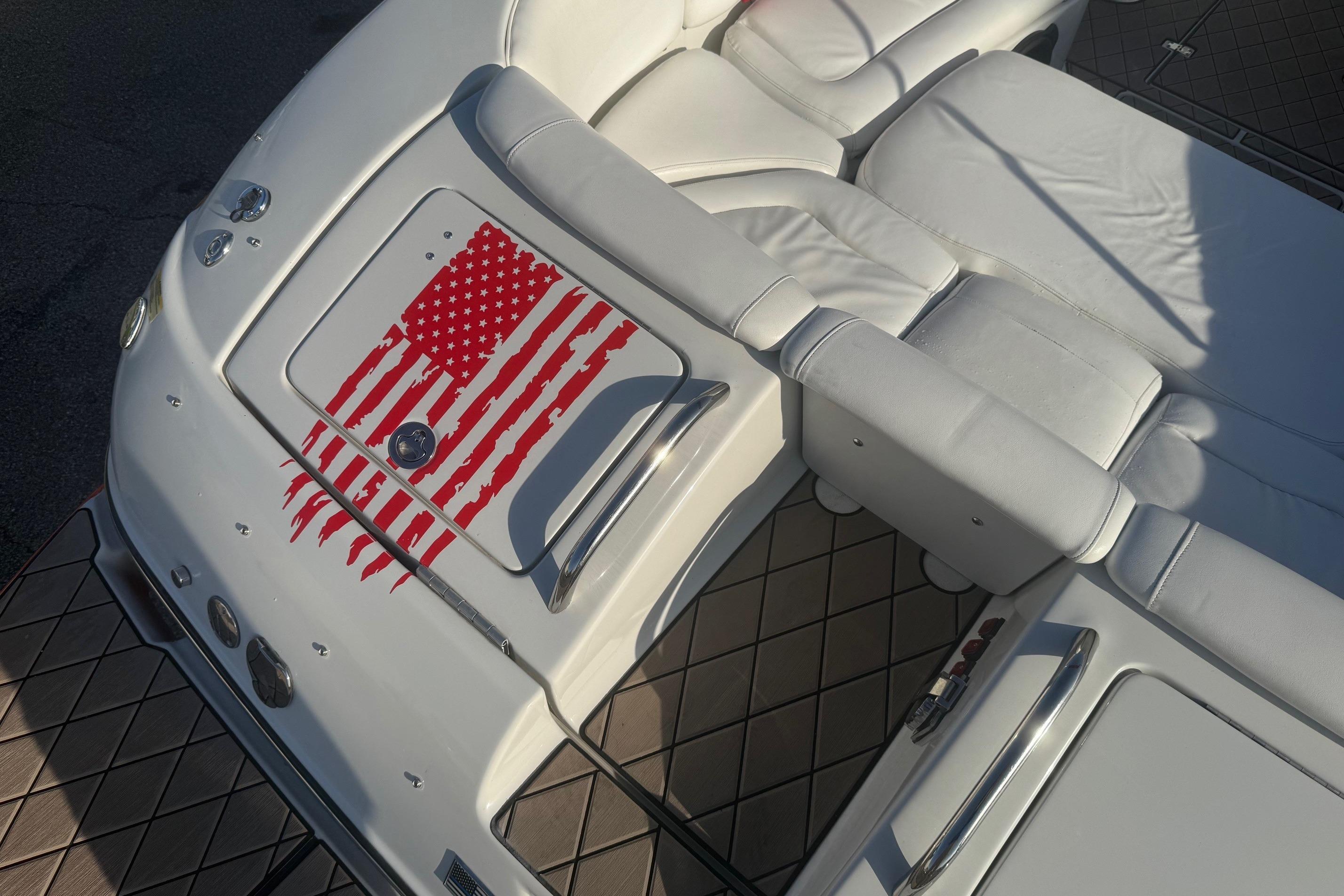 2005 Crownline 270 BR boat interior with American flag design on white upholstery.