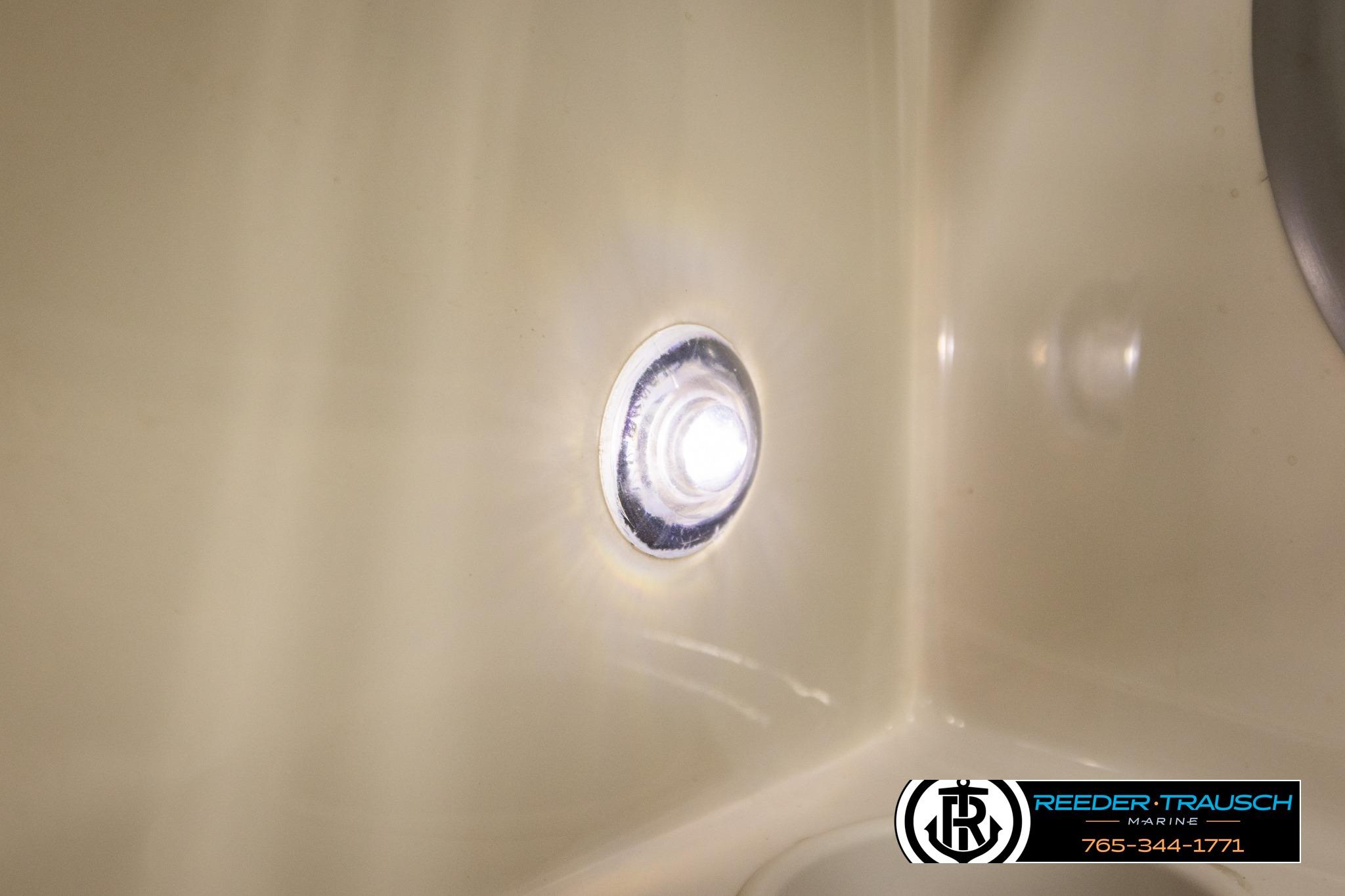 LED light inside a 2016 Tahoe 450 TS boat, illuminating the interior.