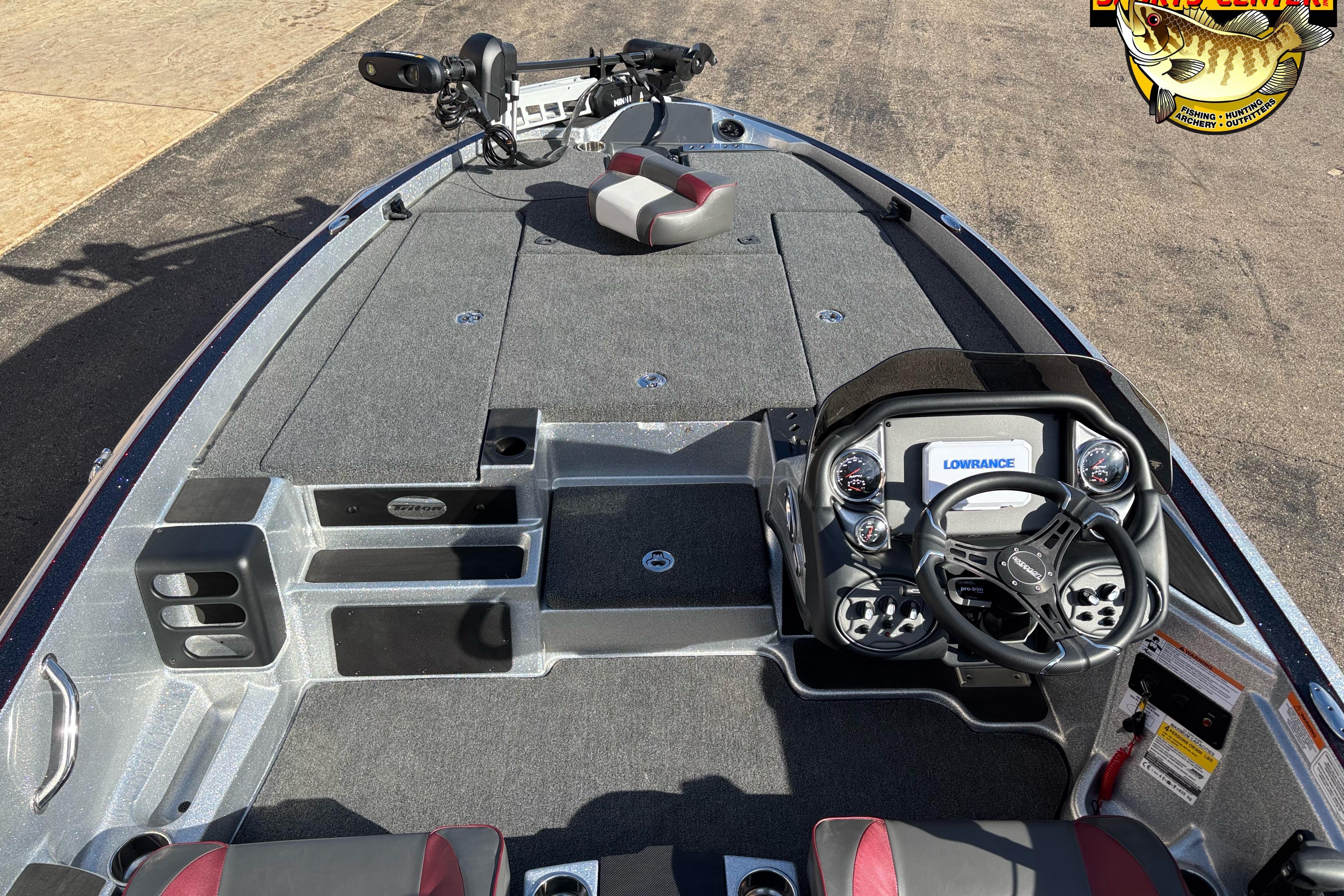 2025 Triton 18 TrX boat interior with steering console and fishing deck.