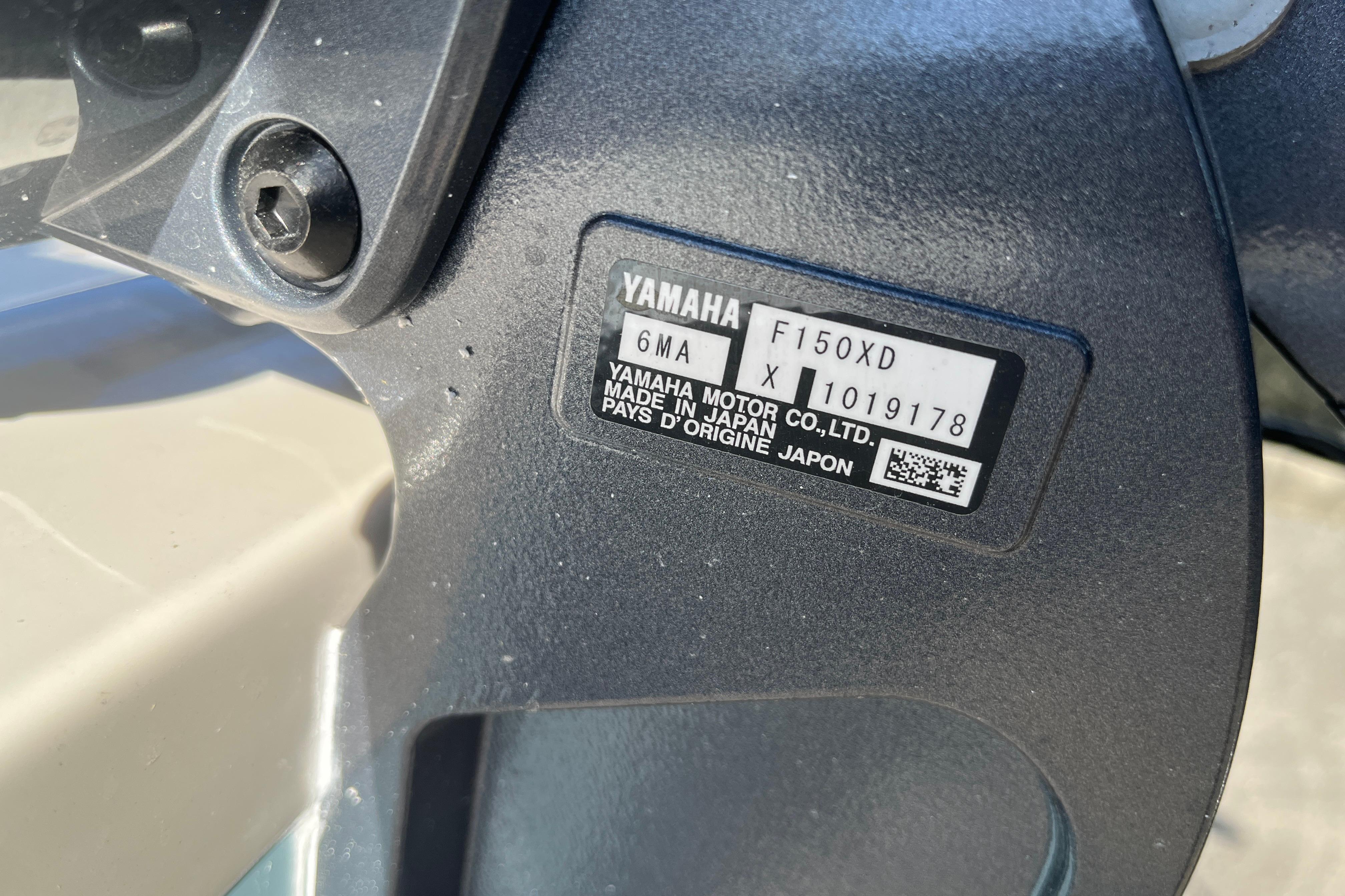 Close-up of Yamaha F150XD engine label on Bulls Bay 2200, 2026 model.