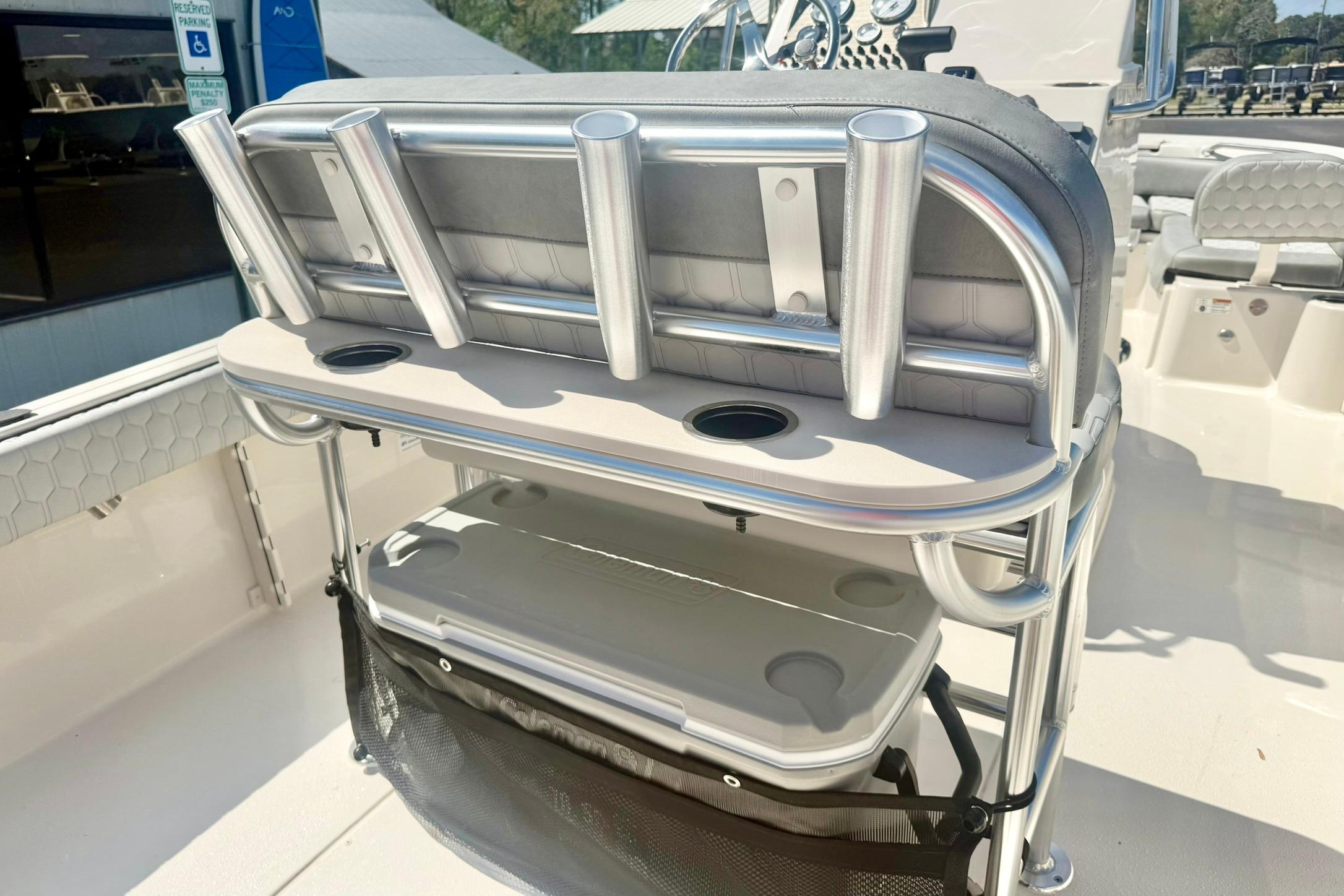 2026 Carolina Skiff 21 Ultra Elite boat interior with rod holders and seating.