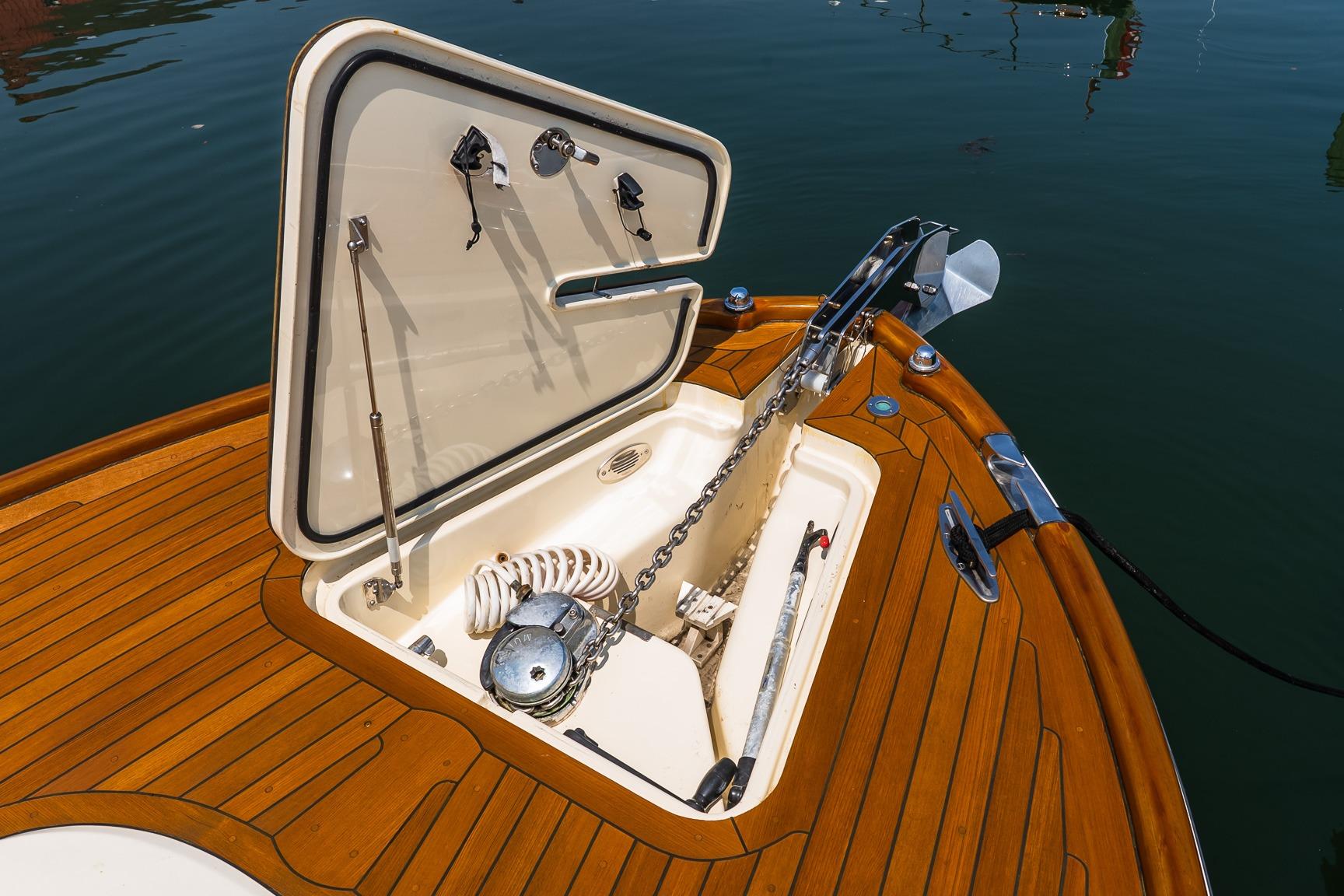 Open anchor hatch on 2005 Hinckley Talaria 29R boat, showcasing deck details.