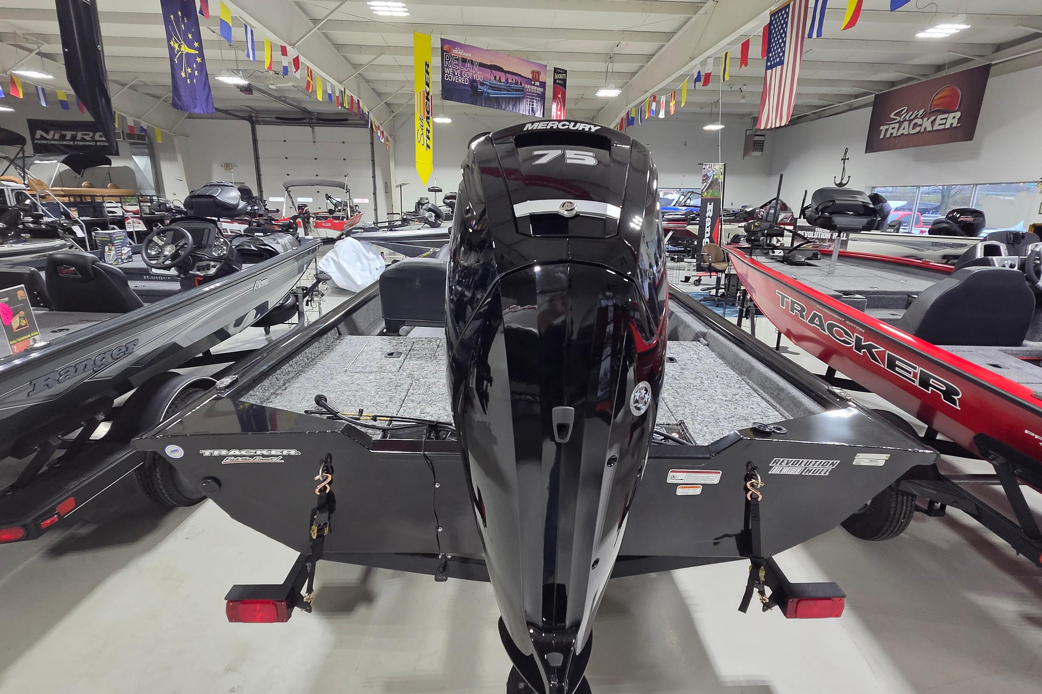 2026 Tracker Pro Team 175 Crappie Edition boat with Mercury 75 engine in showroom.