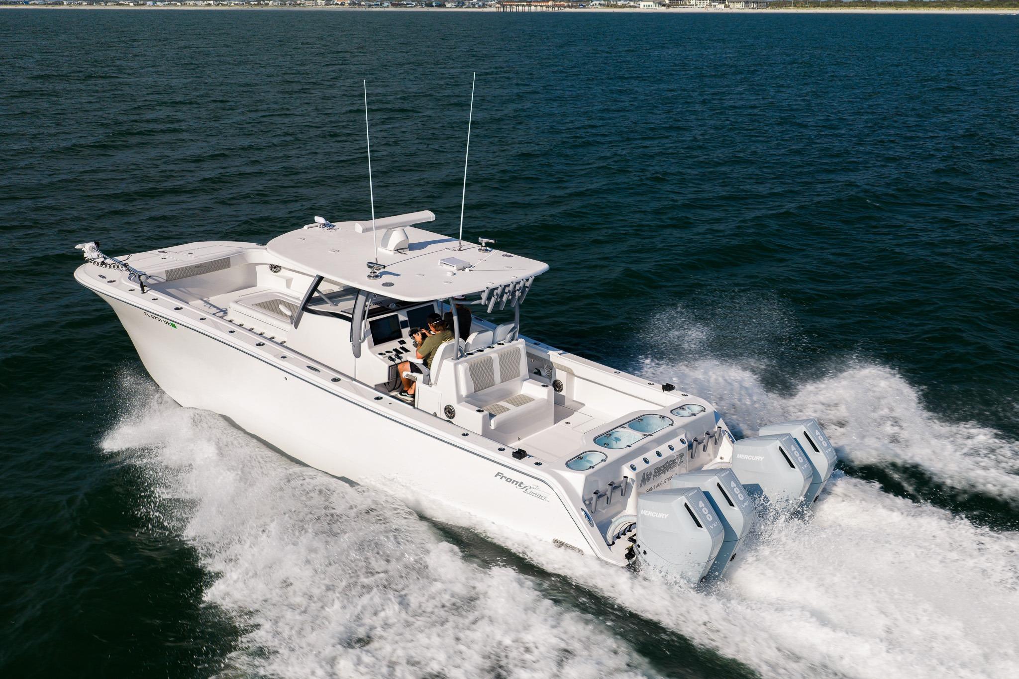 2026 Front Runner 37 Catamaran cruising on open water, showcasing sleek design and powerful engines.
