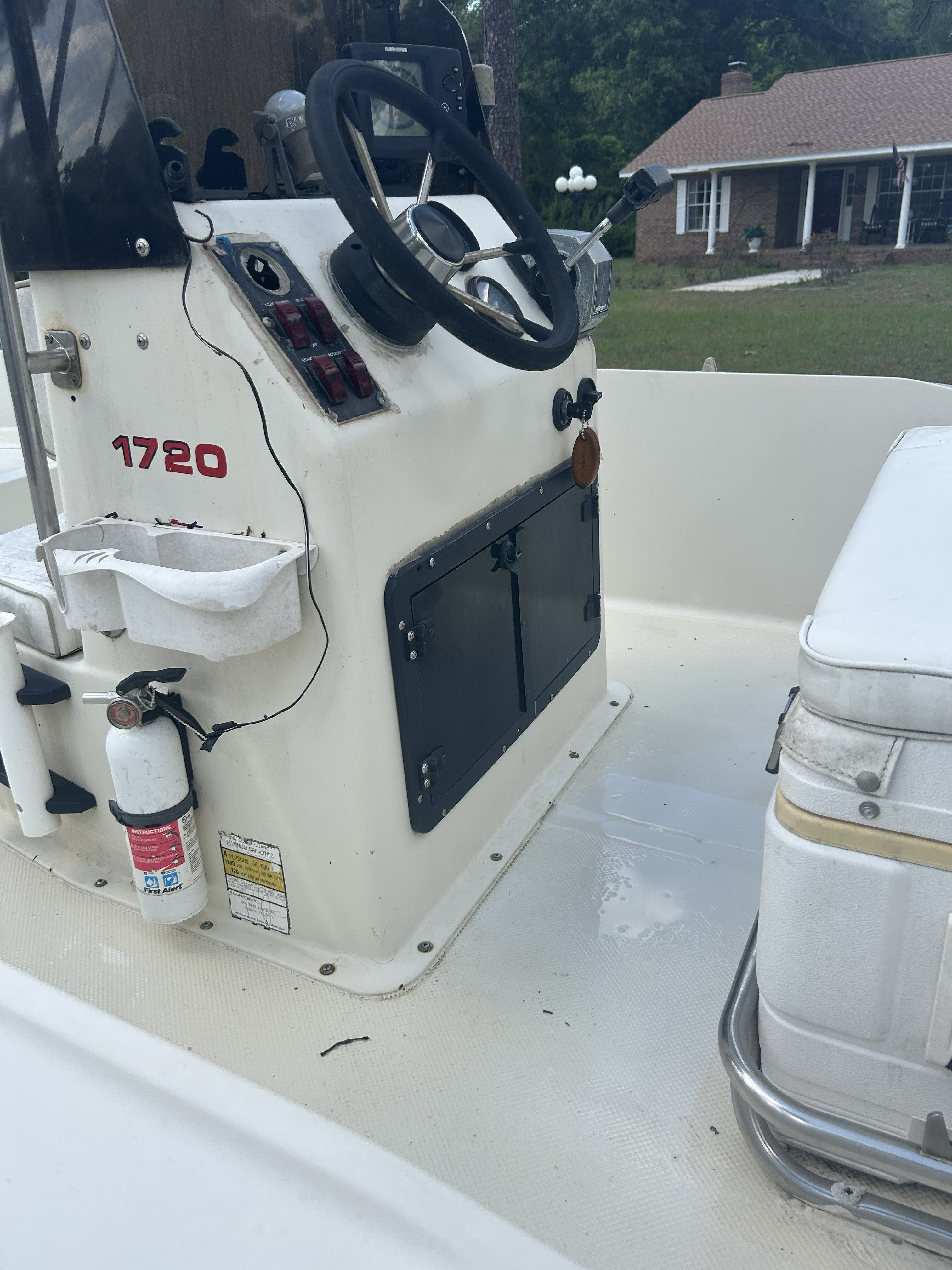 Interior view of a 1993 Key West 1720 boat with steering console.
