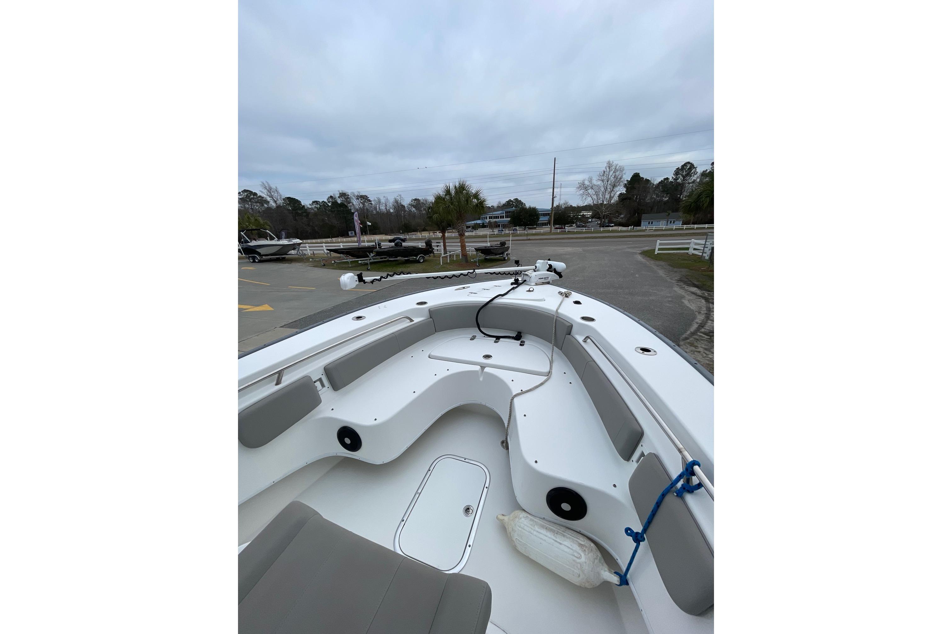 2023 Cape Horn 24 XS boat interior with seating and storage compartments.