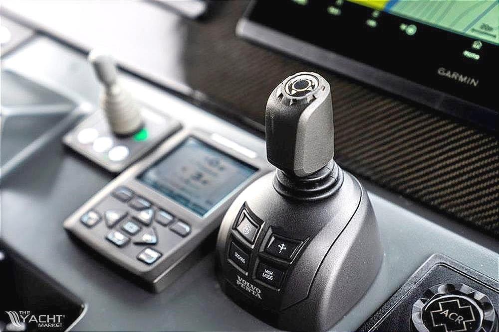 Control panel of 2013 Windy SR52 yacht with joystick and navigation display.