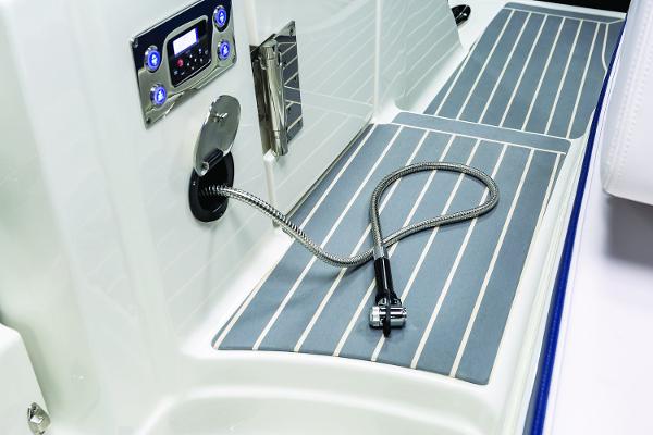 Manufacturer Provided Image: 2019 Chaparral 300 OSX boat deck with control panel and flexible hose.