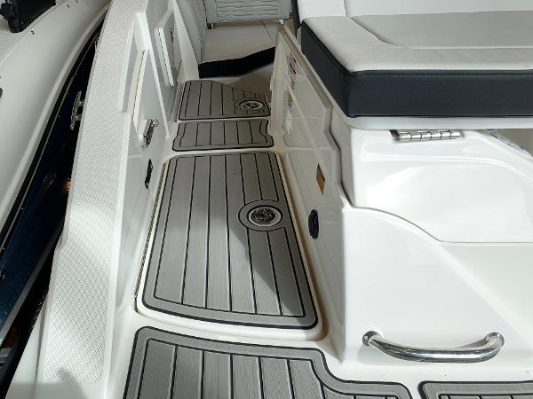 2025 Sea Ray SPX 230 boat interior with sleek seating and modern flooring design.