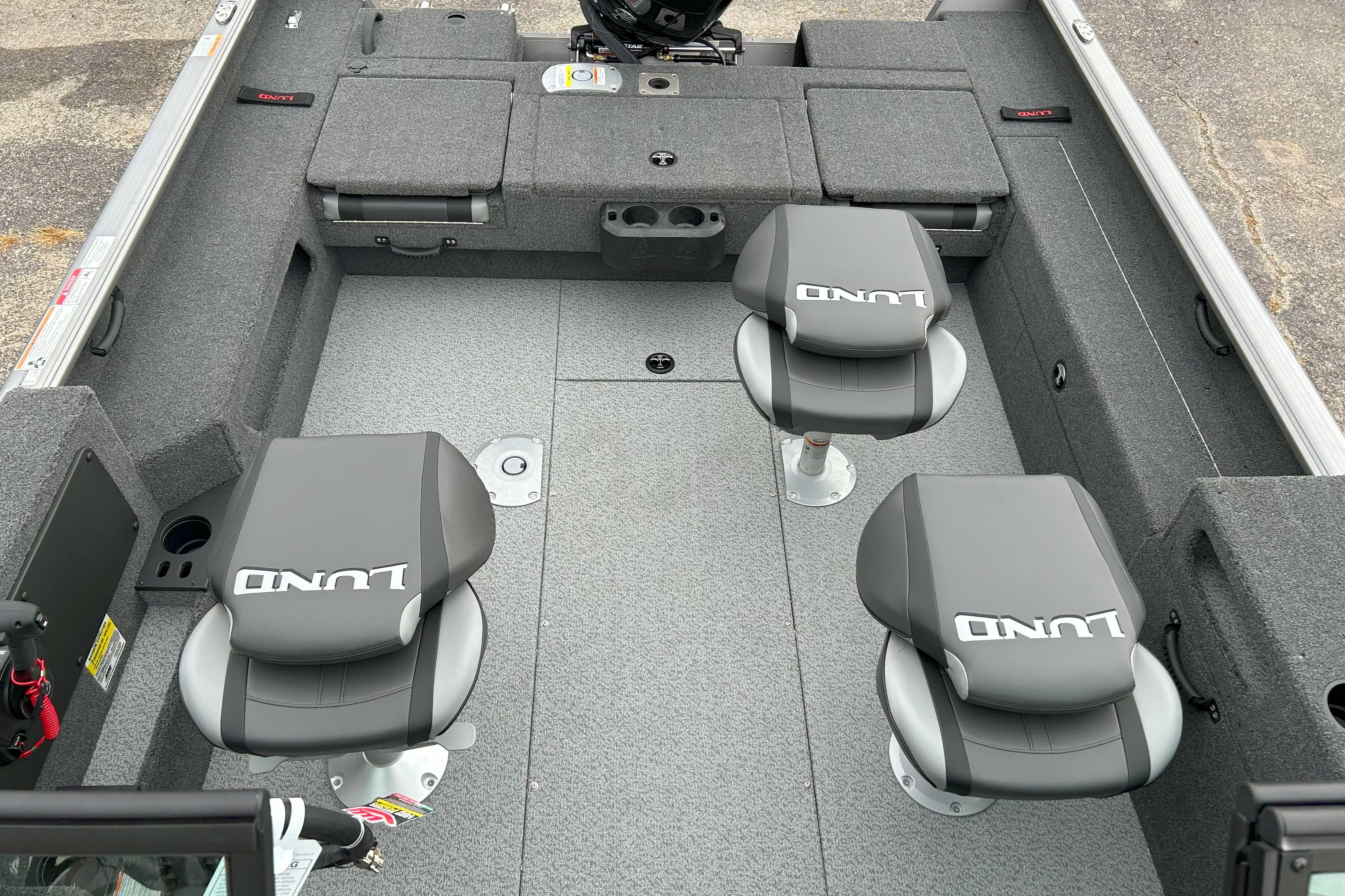 2026 Lund 1875 Impact XS Sport boat interior with two swivel seats.