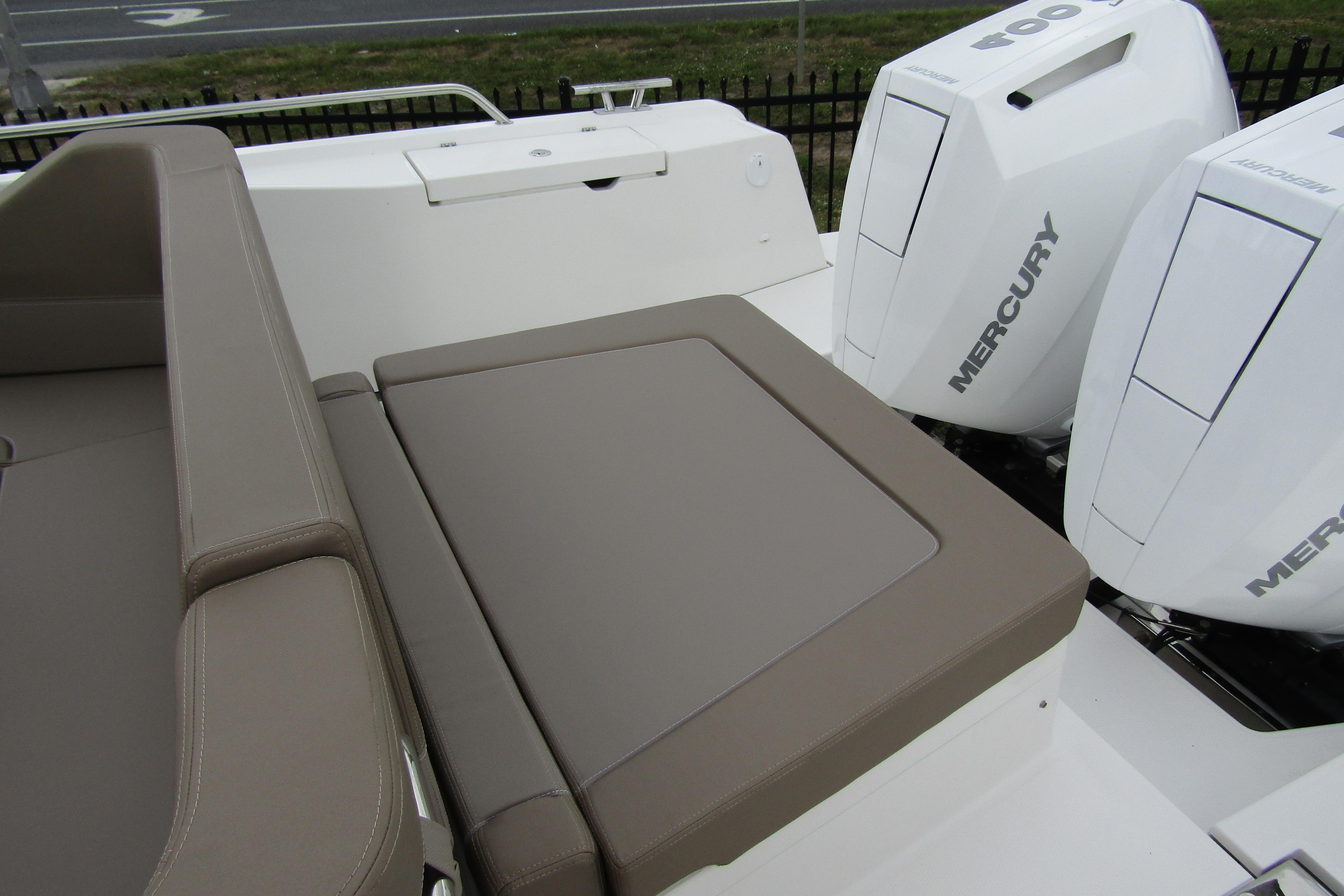 Nimbus Tender 11 boat with Mercury engines, featuring comfortable seating, 2025 model.