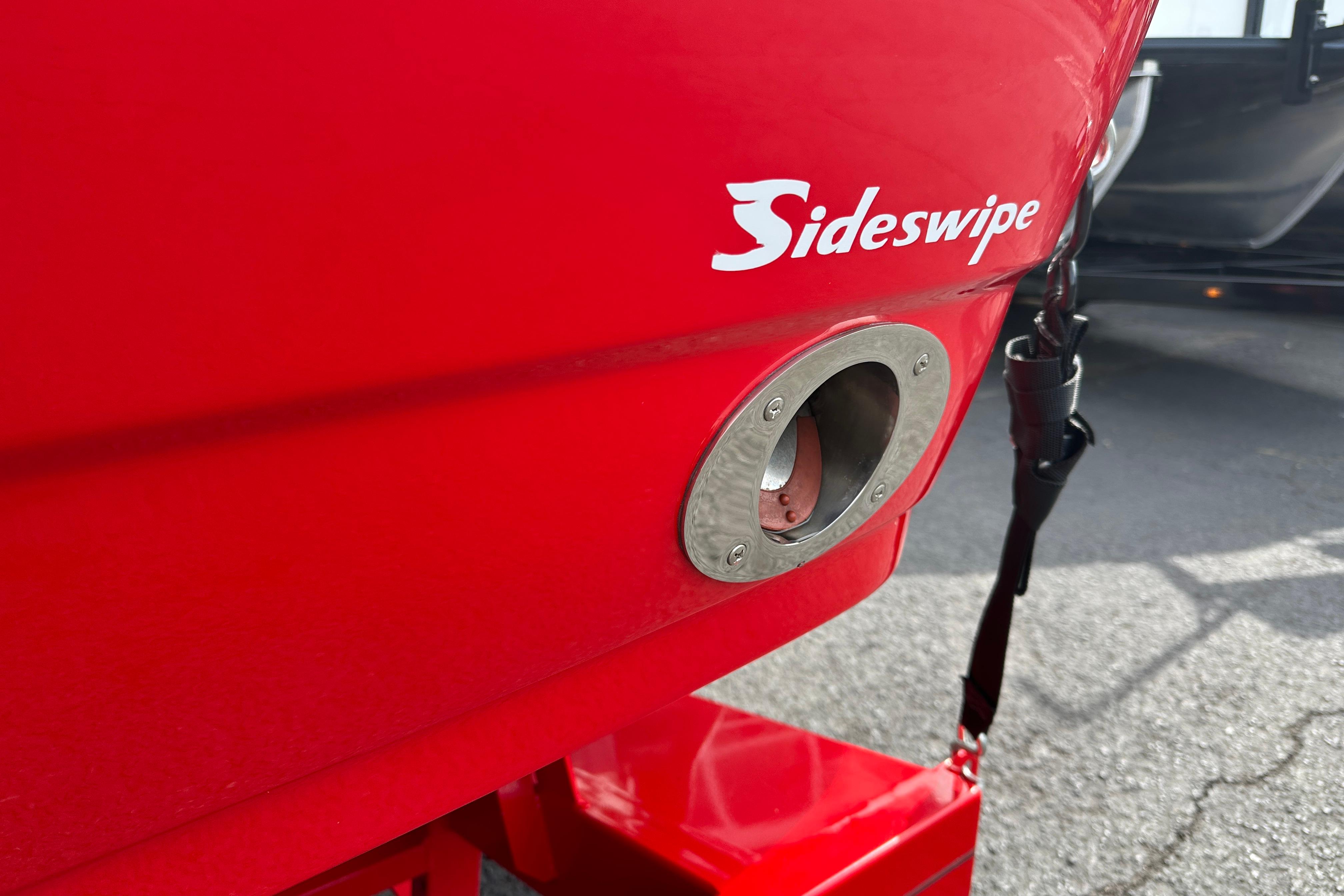 Red 2008 Centurion Enzo SV240 boat with "Sideswipe" branding, featuring a metal exhaust port.