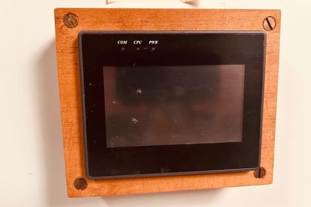 Wooden-framed control panel on 1993 Brooklin Boat Yard Marshall 48.