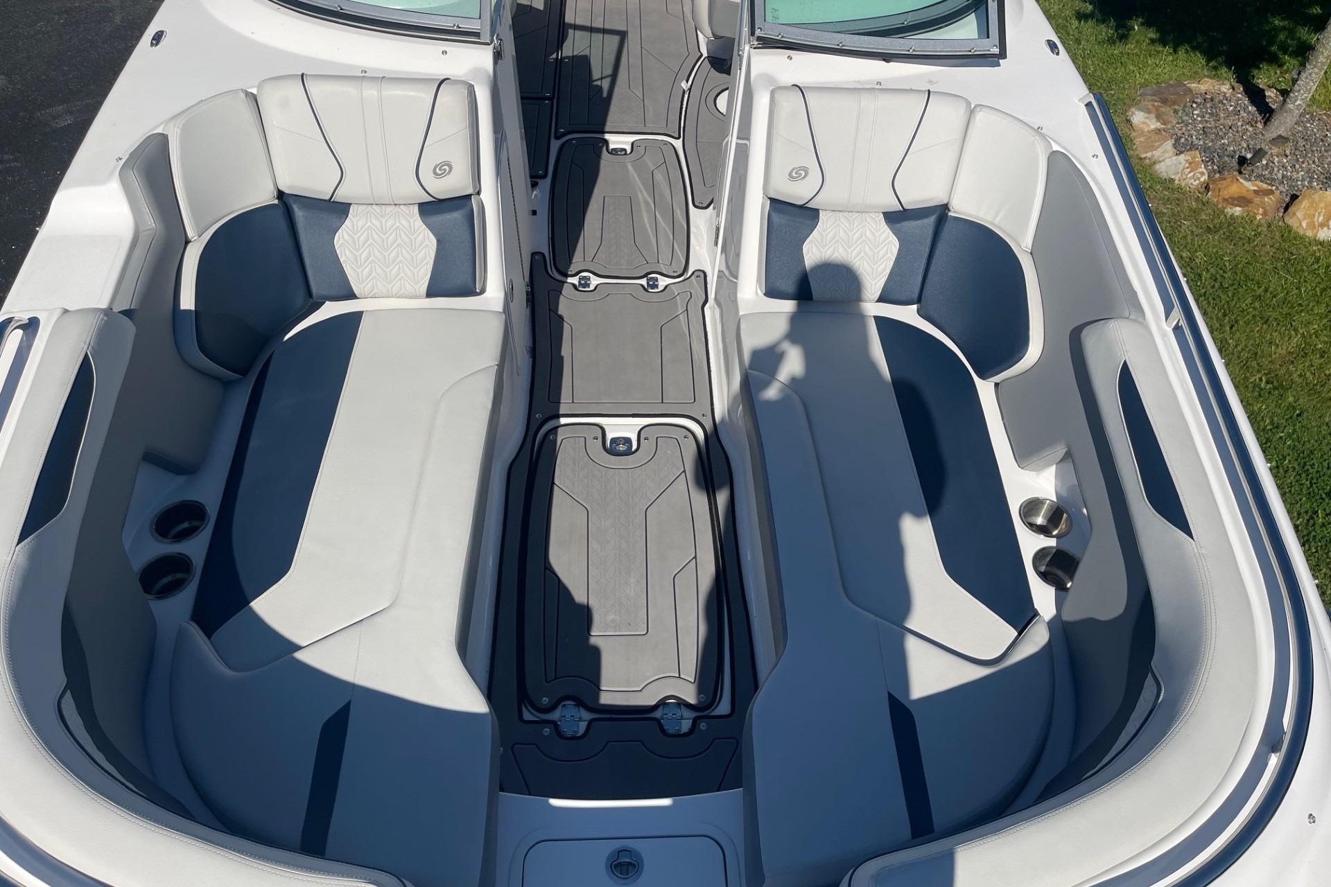2023 Hurricane SunDeck 2400 OB boat interior with spacious seating and modern design.