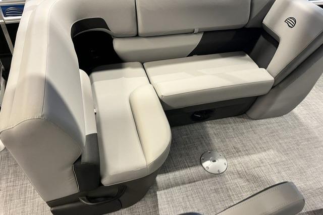 2026 Sun Tracker SportFish 20 DLX boat interior with gray cushioned seating.