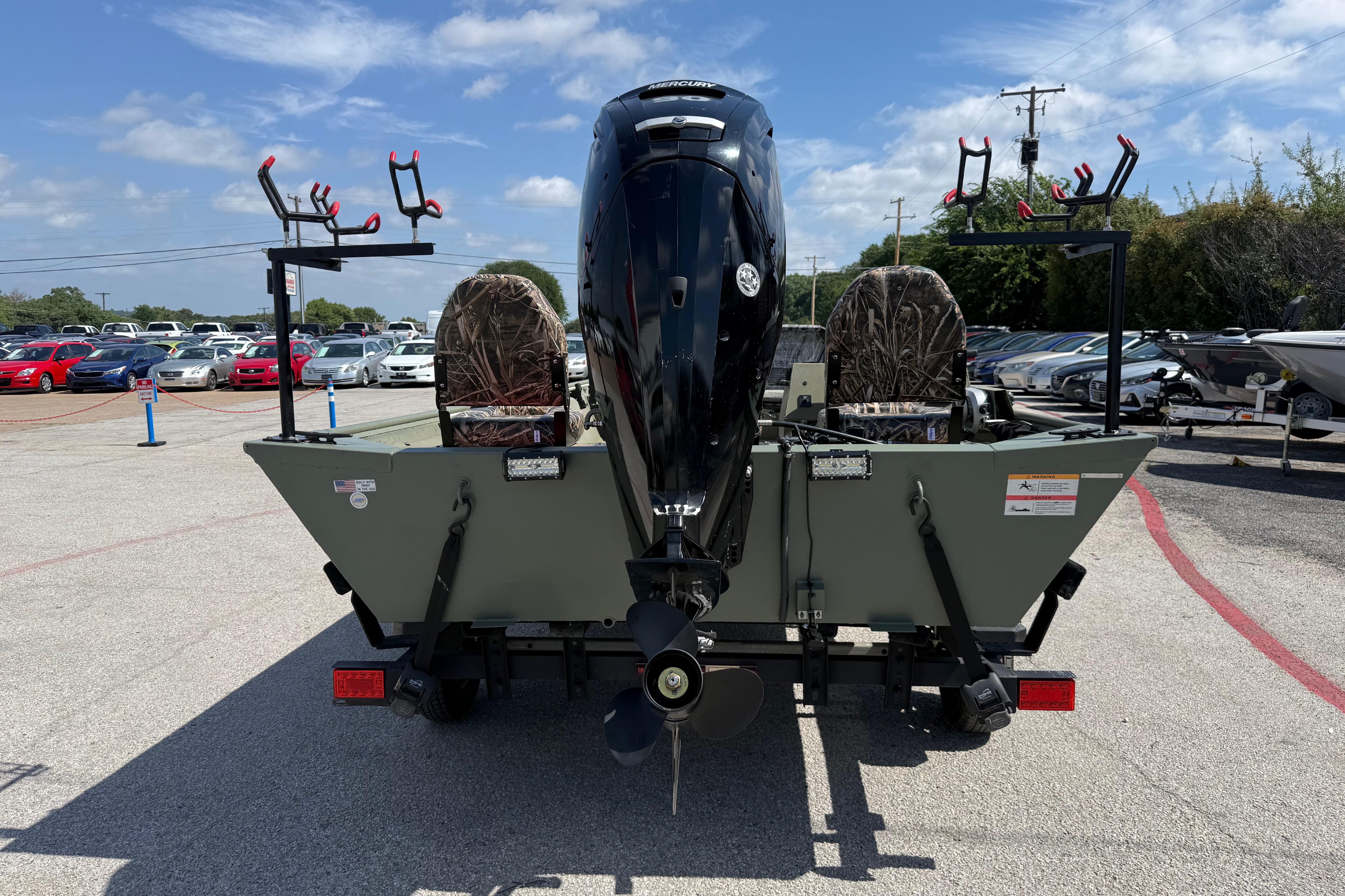The image shows a 2020 Lowe Roughneck 2070 Big River boat with an outboard motor.